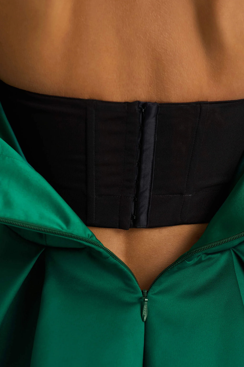 Close up of LVLVS Beverly Dark Green Satin Dress Back Zipper and Open Back Design for Bridesmaid Wear