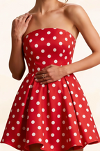 Close up detail LVLVS Red Polka Dot Beverly Dress smooth satin bodice white polka dot pattern gathered waist feminine cocktail attire