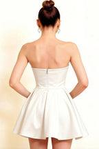 Detailed Back View of LVLVS White Satin Open Back Dress Highlighting Corset Style Boning and Flattering Silhouette