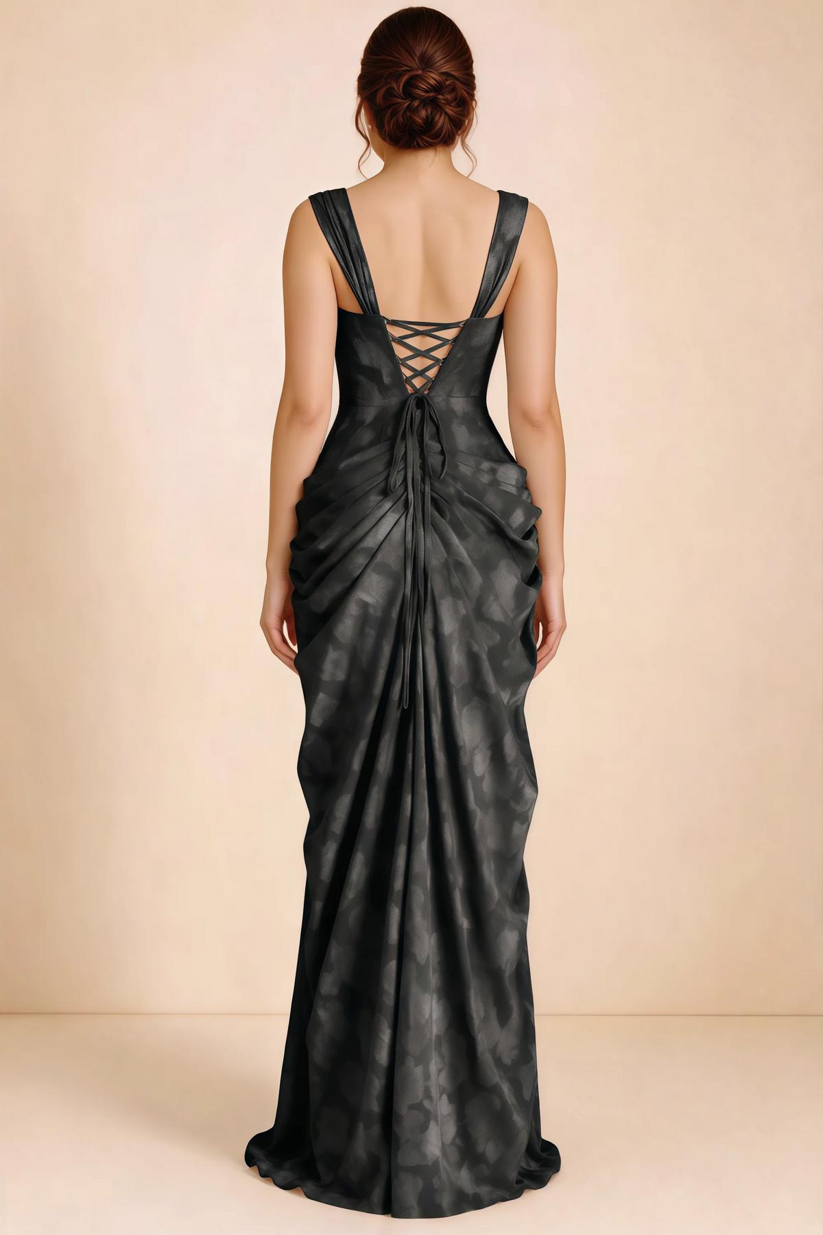Rear studio view of Blair black dress showing the fitted waist and long draped skirt