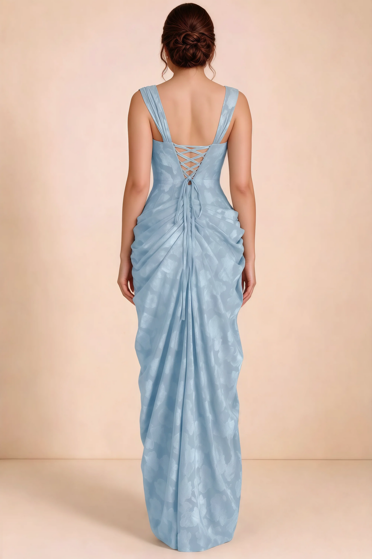 Rear studio view of Blair powder blue dress showing the fitted waist and long draped skirt