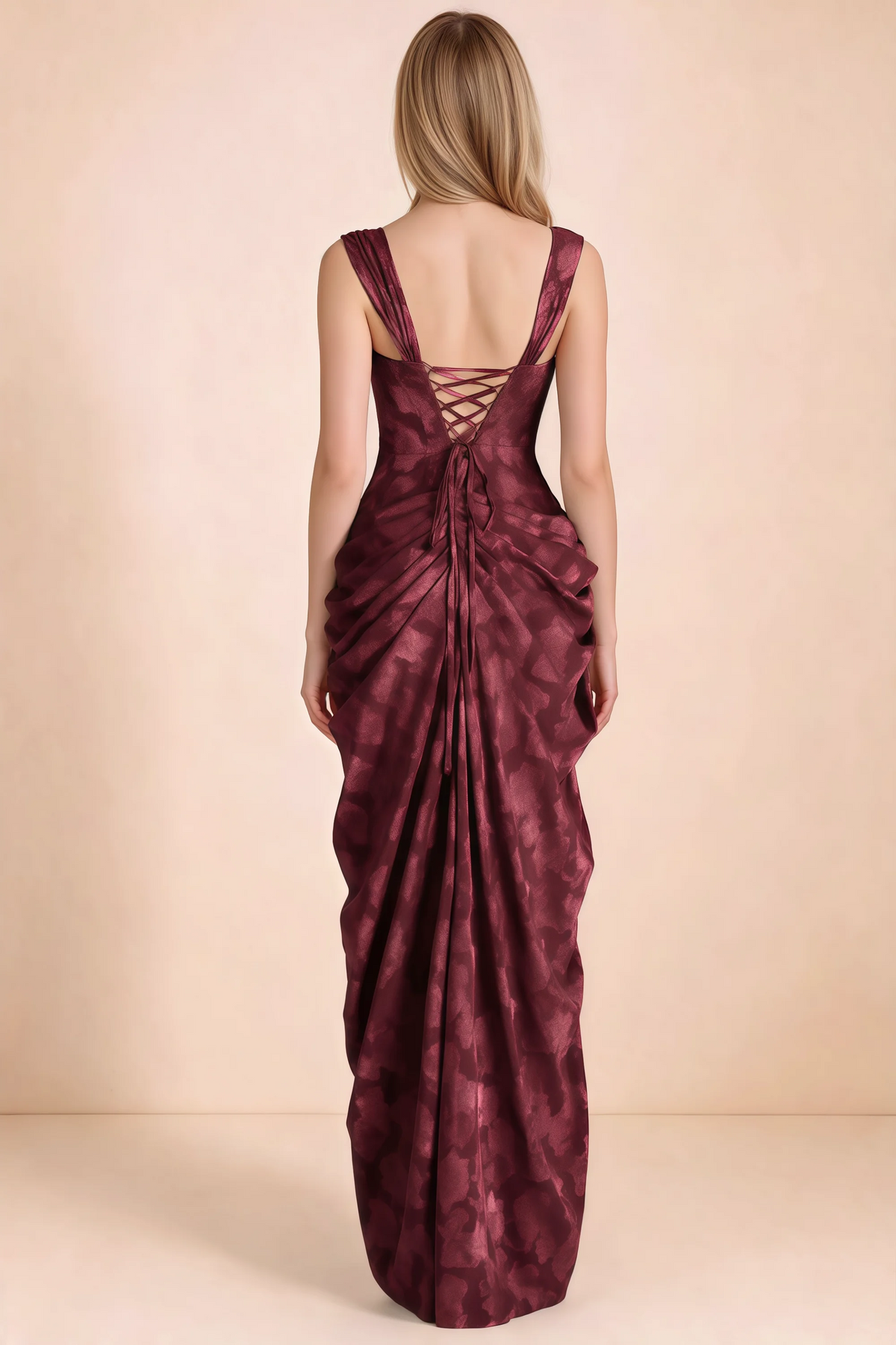Rear studio view of Blair wine dress showing wide shoulder straps and crossed back lacing