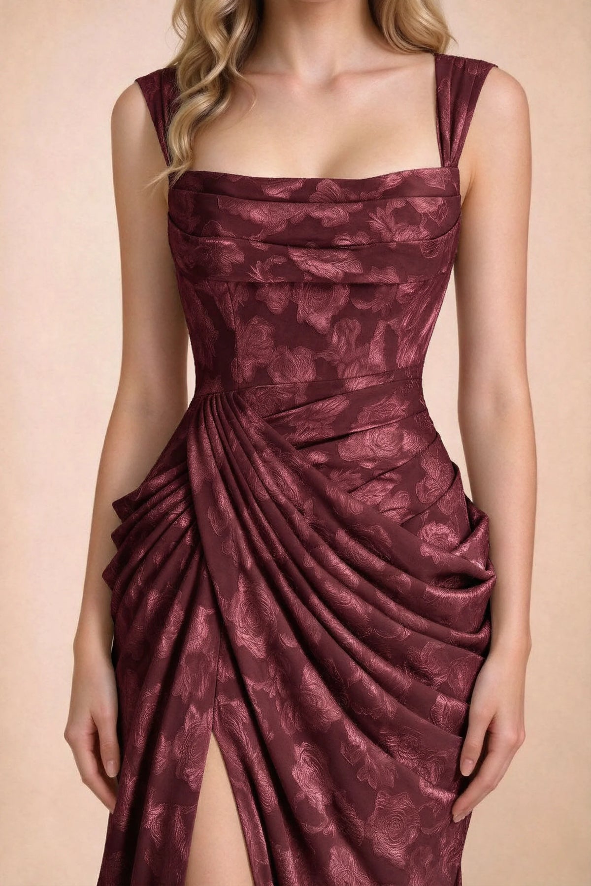 Close-up of Blair wine square neckline, pleated bodice and diagonal hip gathers