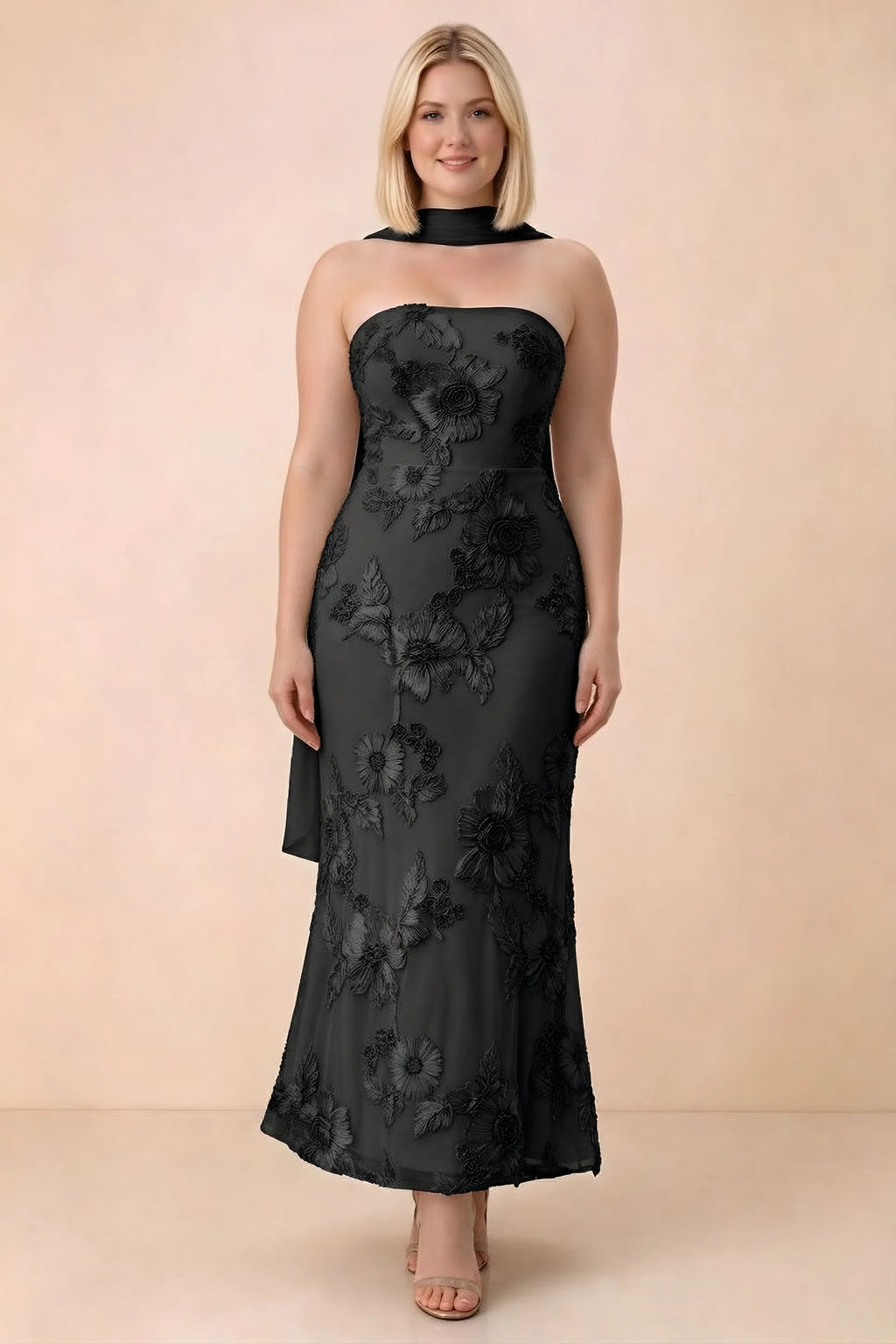 Front studio view of Carey black floral maxi dress with the scarf wrapped around the neck