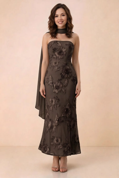 Front studio view of Carey chocolate strapless floral applique maxi dress with a matching scarf
