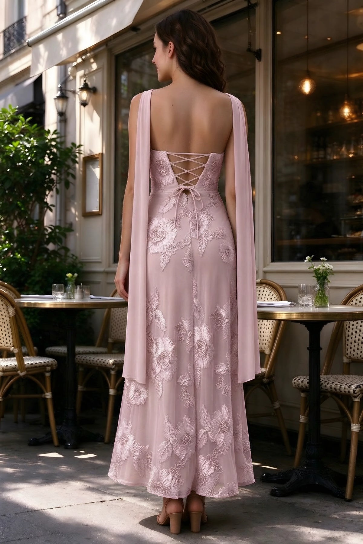 Outdoor rear view of Carey dusty lilac dress showing the lace-up back and long scarf ends