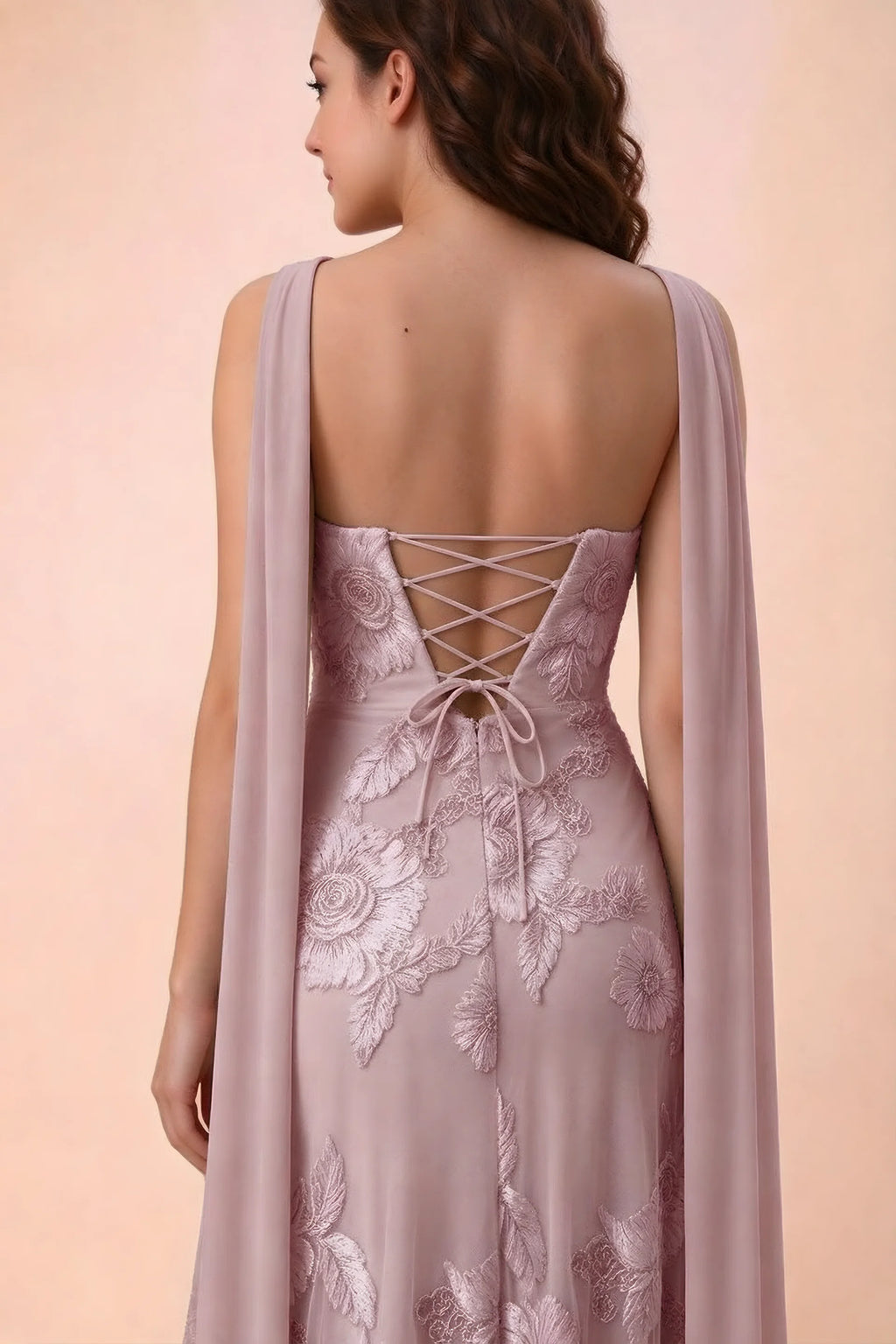 Close-up of Carey dusty lilac crossed back lacing with scarf ends over the shoulders