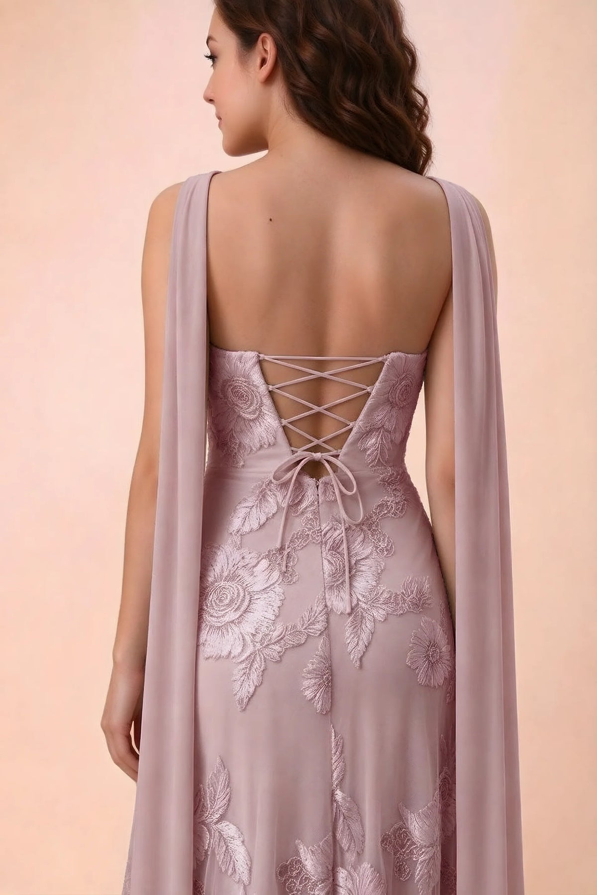 Close-up of Carey dusty lilac crossed back lacing with scarf ends over the shoulders