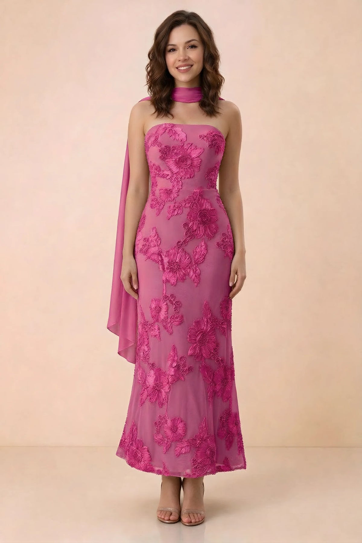 Front studio view of Carey fuchsia strapless floral applique maxi dress with a matching scarf