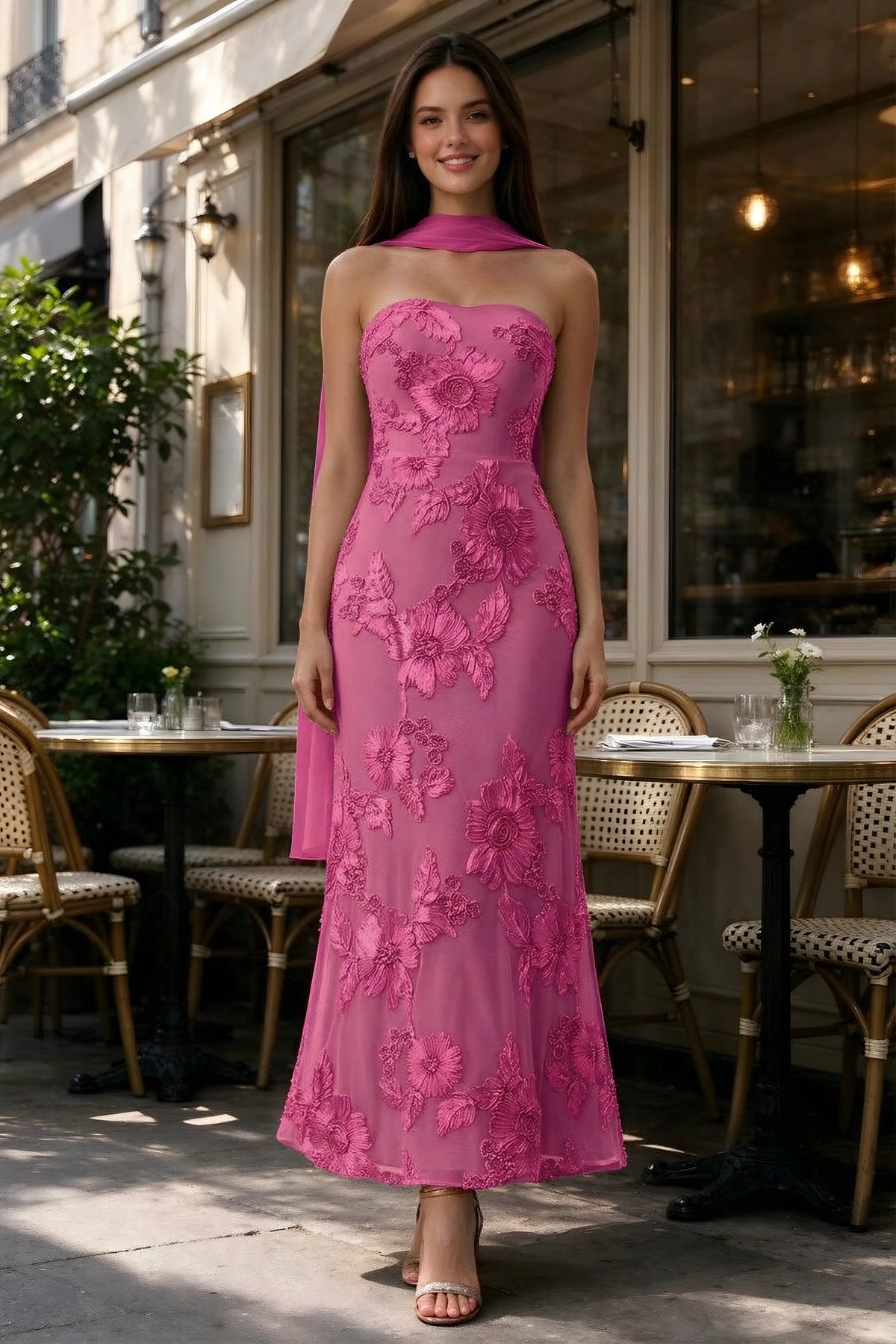 Outdoor front view of Carey fuchsia floral dress and matching scarf outside a cafe