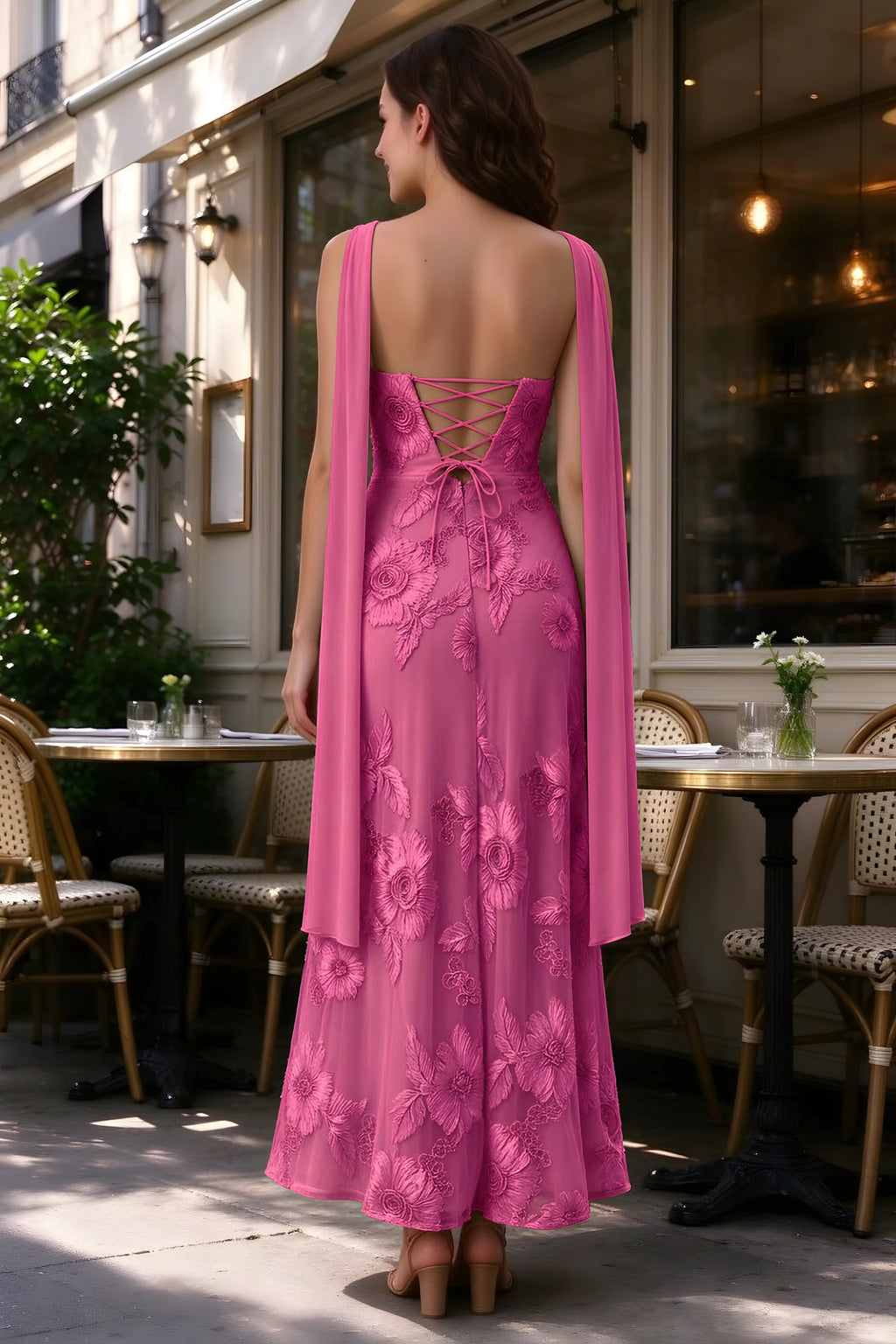 Outdoor rear view of Carey fuchsia dress showing the lace-up back and long scarf ends