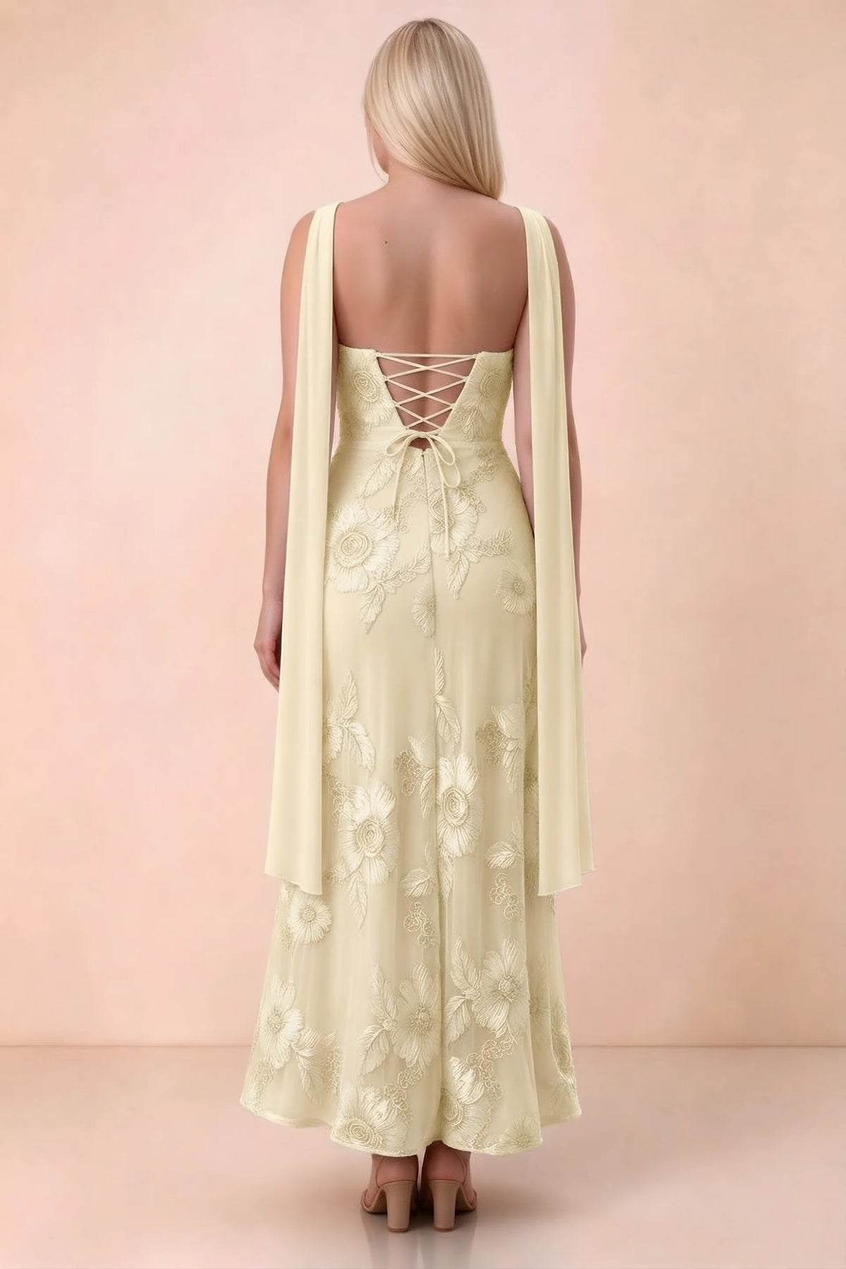 Rear studio view of Carey lemon dress showing the gently flared ankle-length skirt