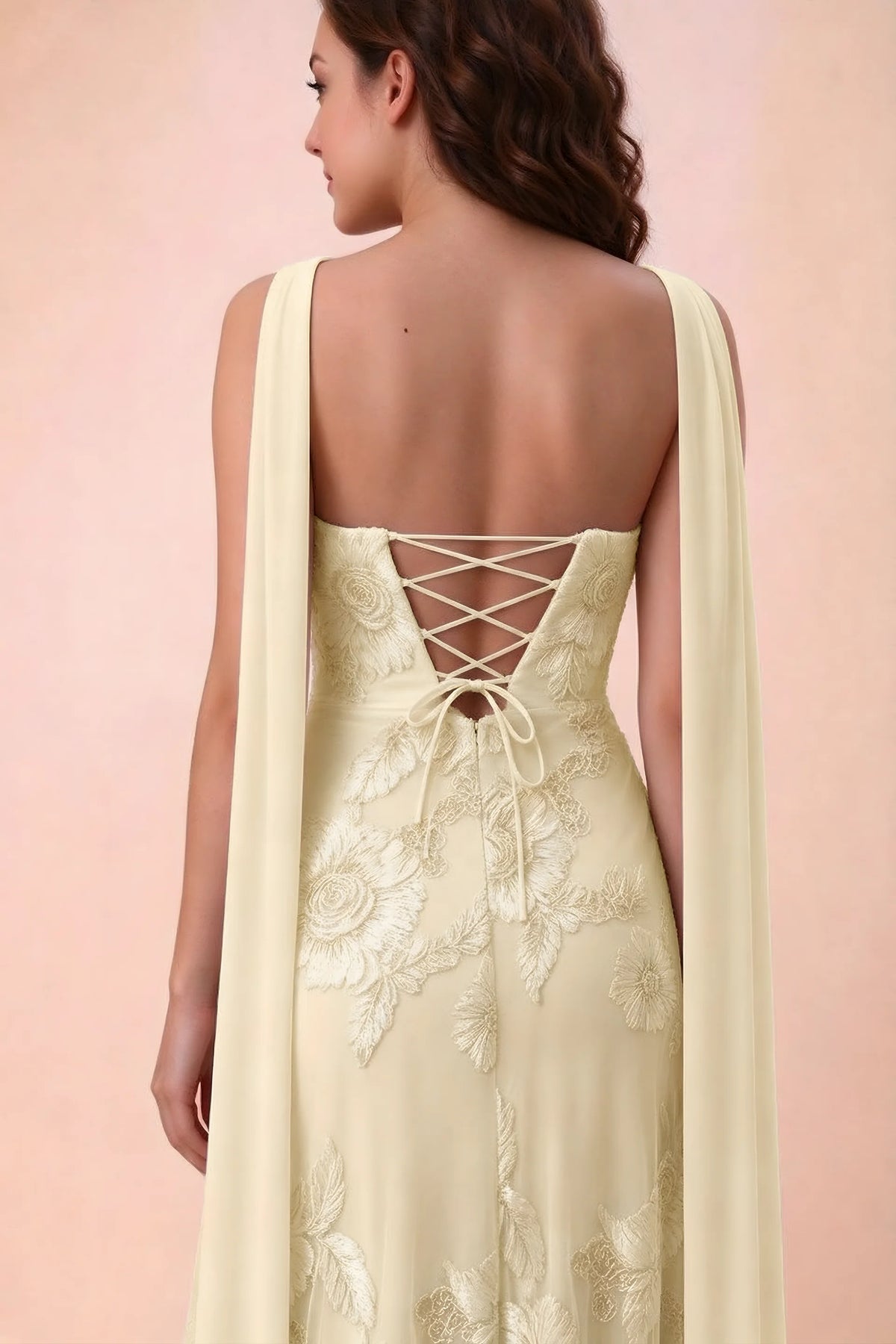 Close-up of Carey lemon crossed back lacing with scarf ends over the shoulders