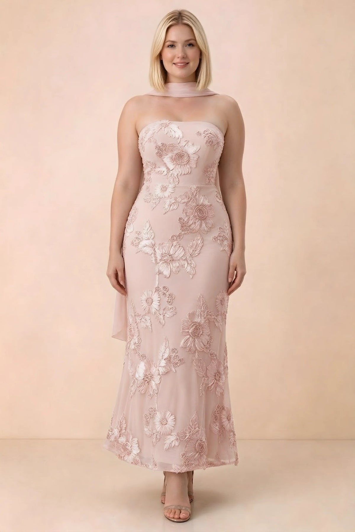 Front studio view of Carey light pink floral maxi dress with the scarf wrapped around the neck