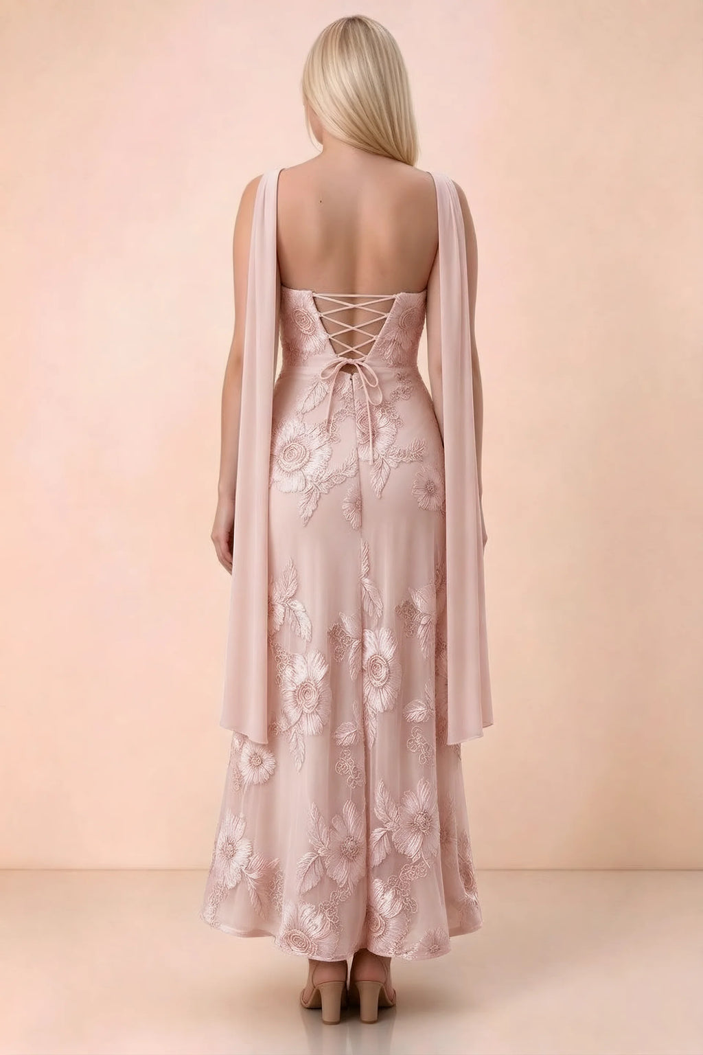 Rear studio view of Carey light pink dress showing the gently flared ankle-length skirt
