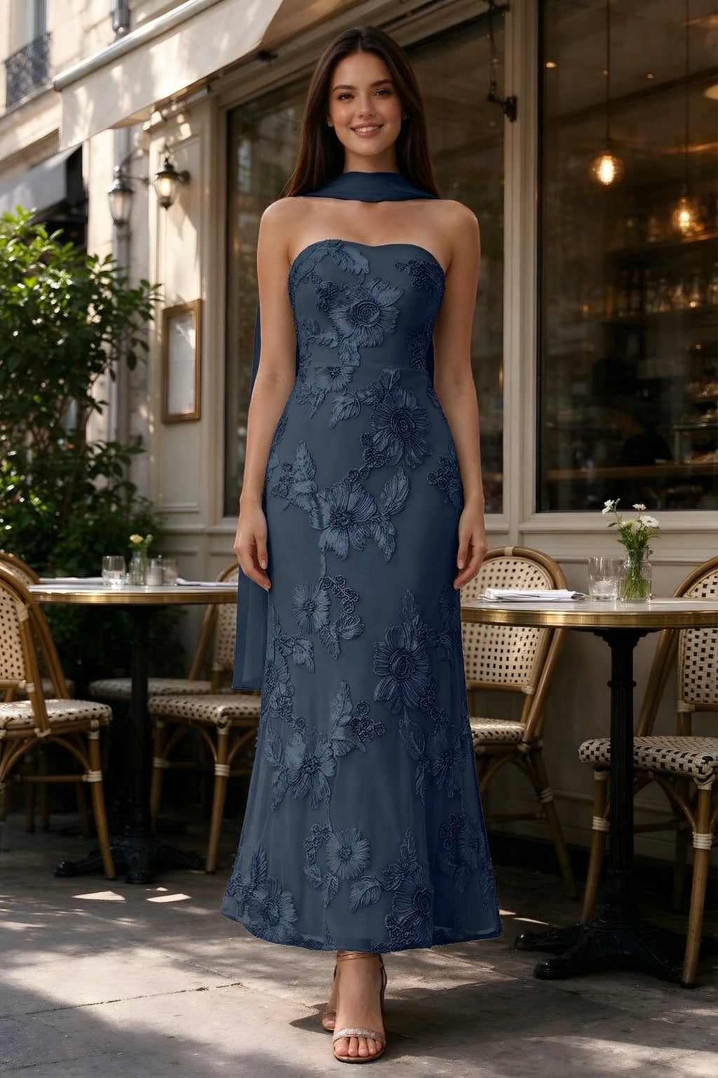 Outdoor front view of Carey navy floral dress and matching scarf outside a cafe