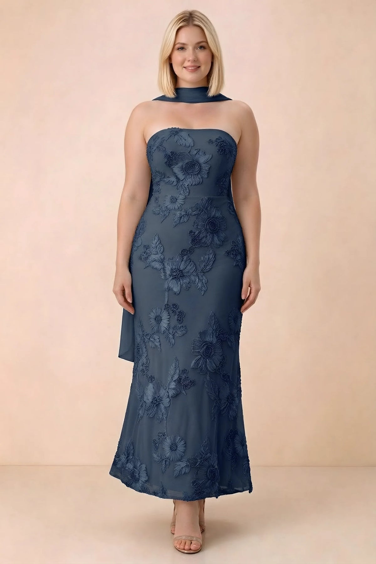 Front studio view of Carey navy floral maxi dress with the scarf wrapped around the neck