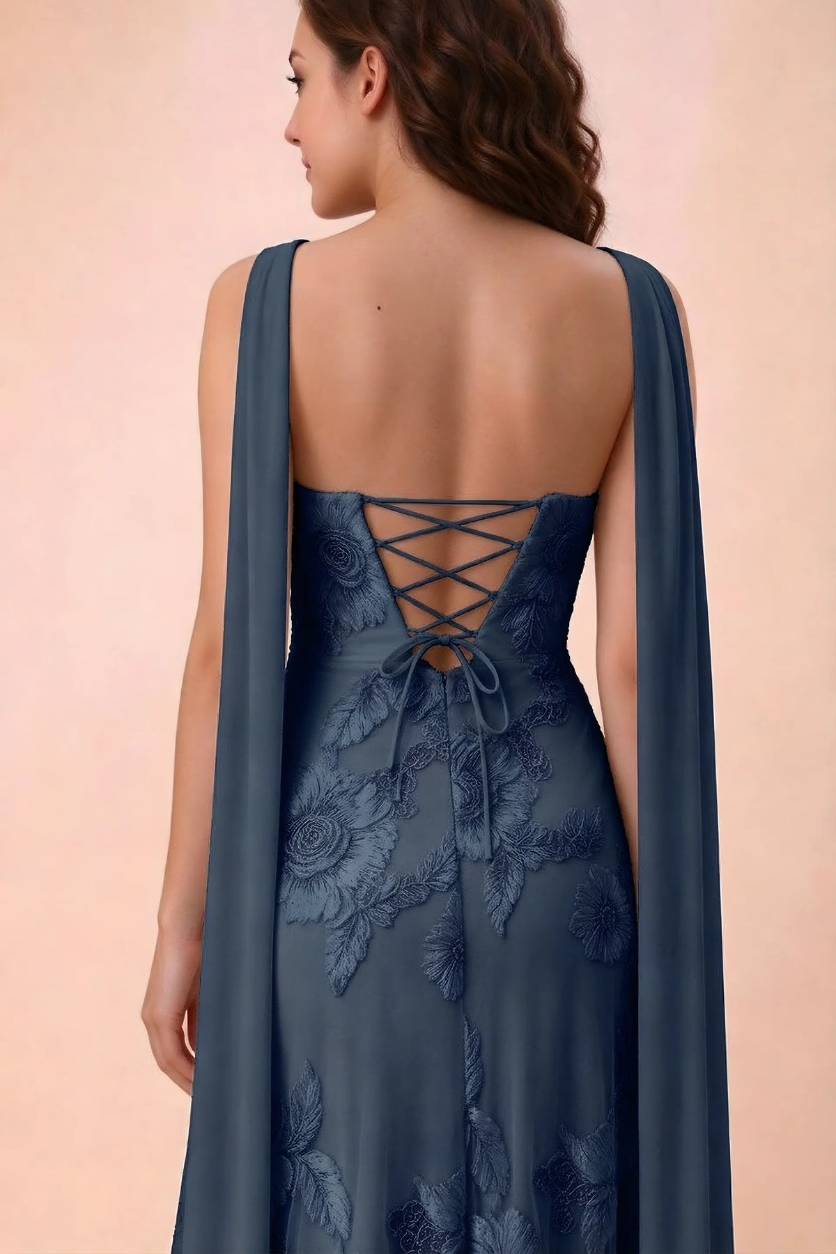 Close-up of Carey navy crossed back lacing with scarf ends over the shoulders