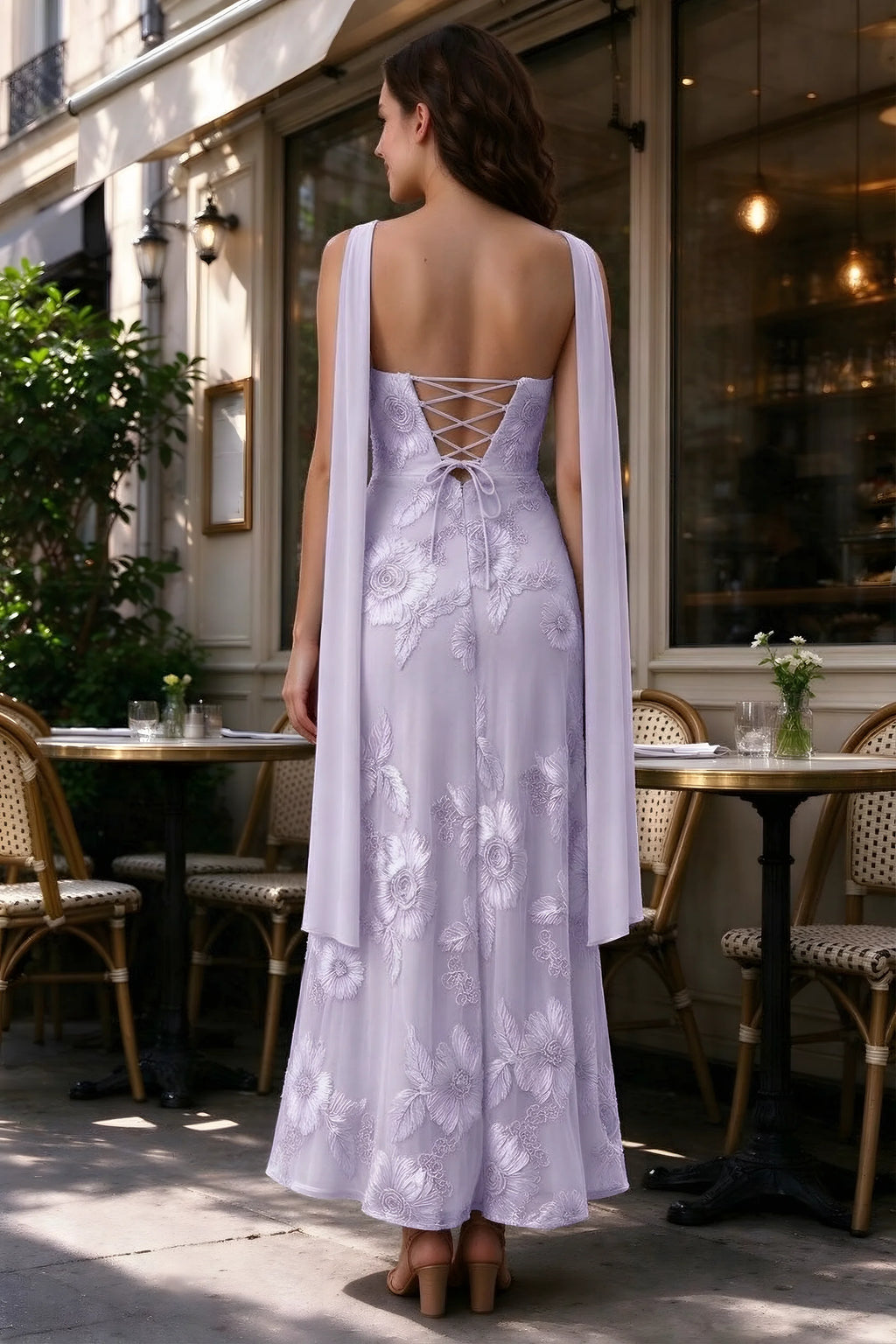 Outdoor rear view of Carey pale purple dress showing the lace-up back and long scarf ends