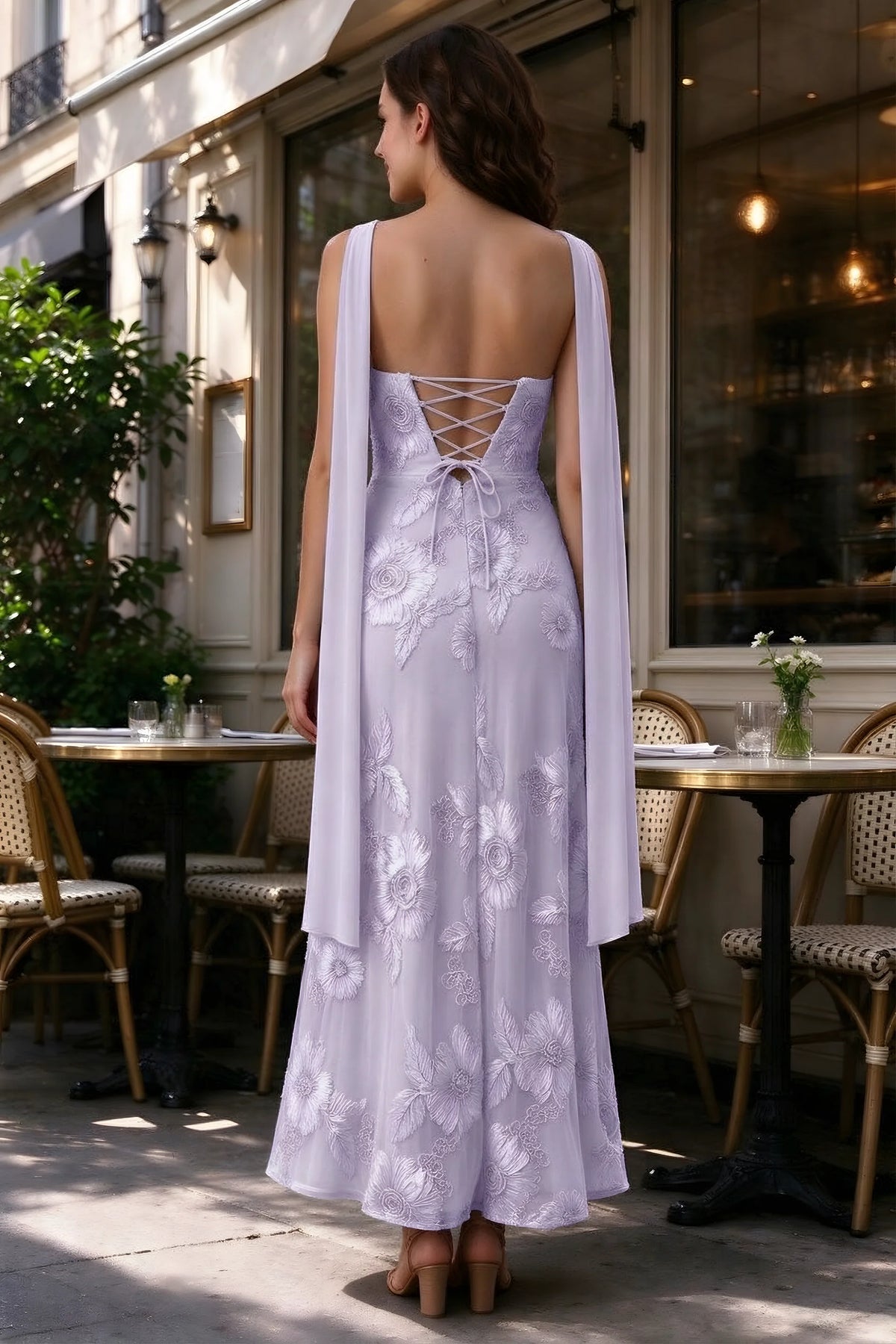Outdoor rear view of Carey pale purple dress showing the lace-up back and long scarf ends