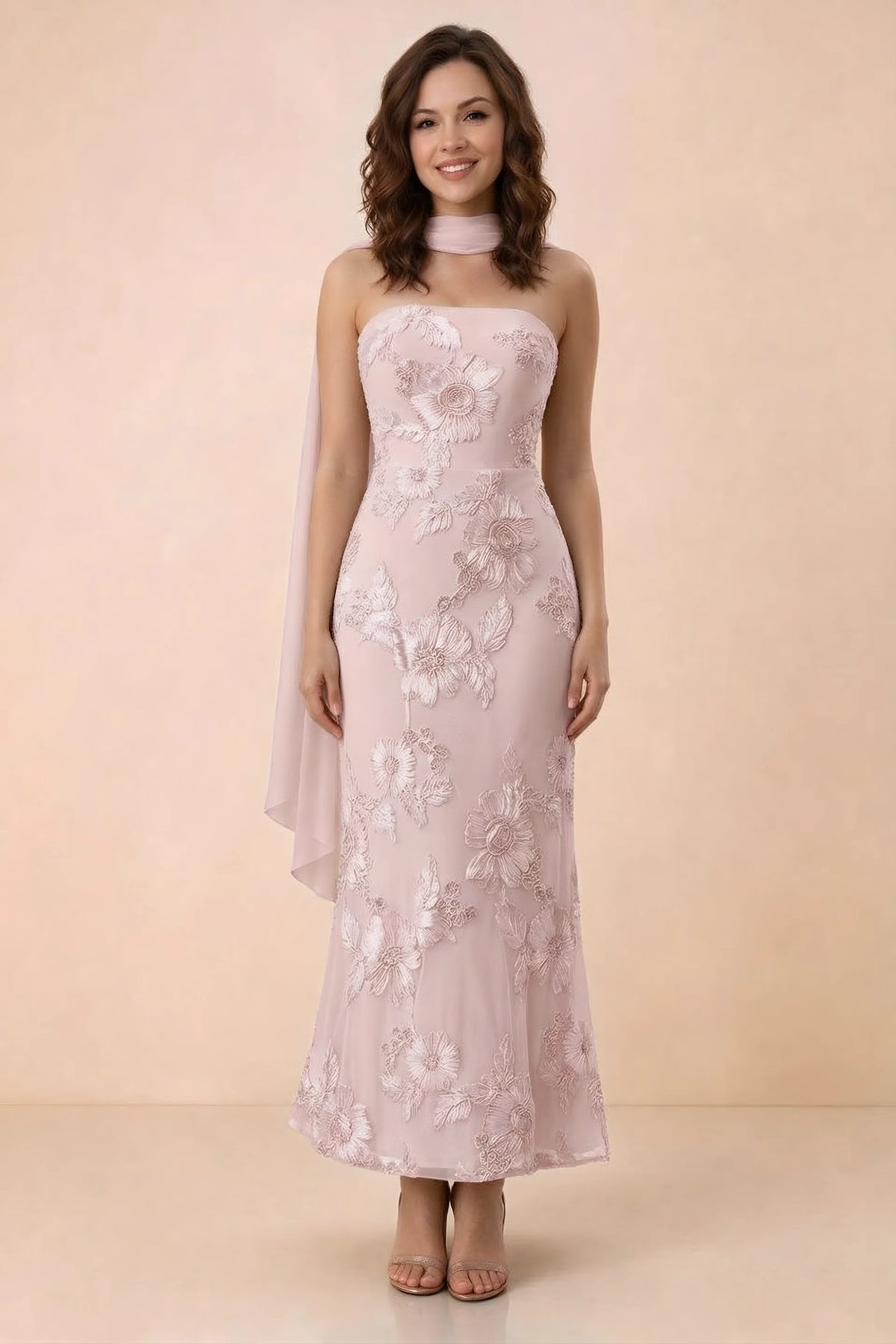 Front studio view of Carey pink strapless floral applique maxi dress with a matching scarf
