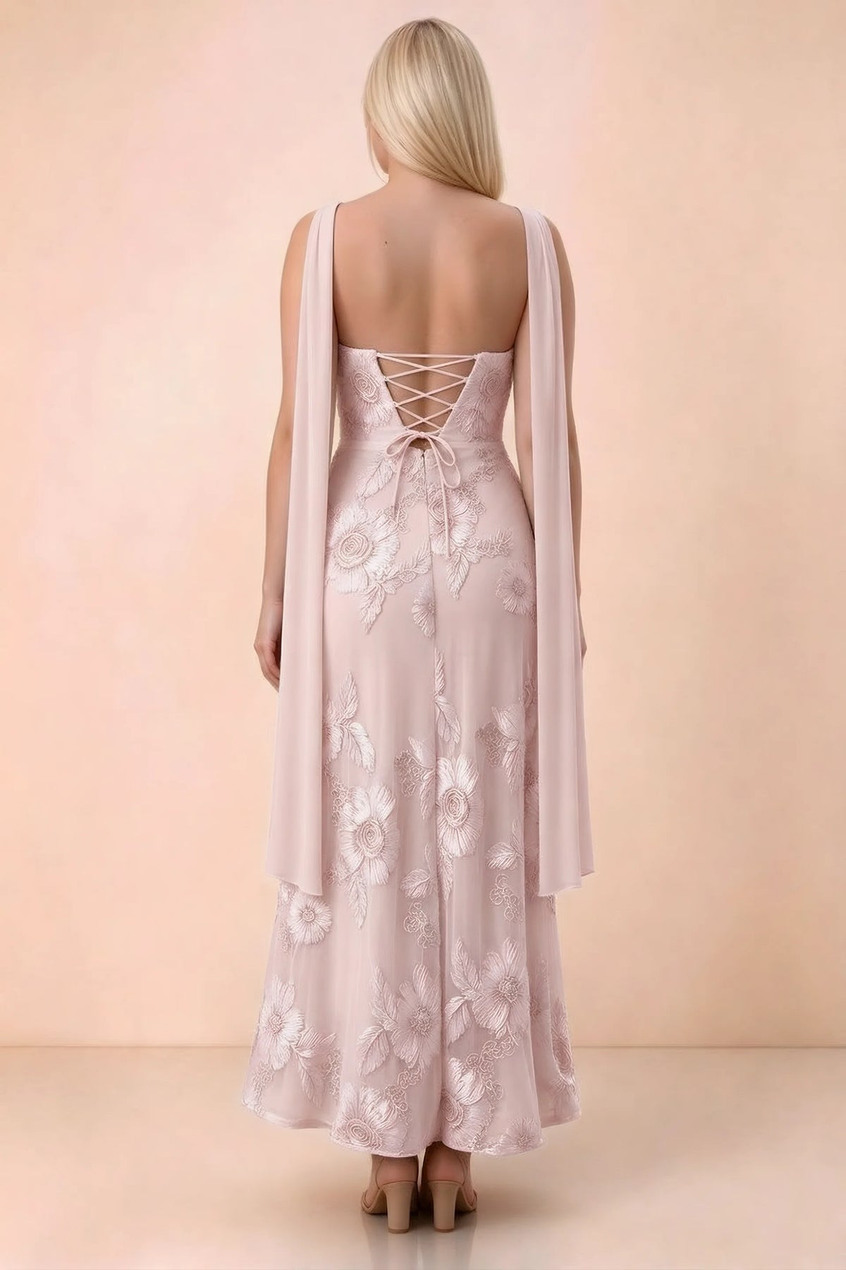 Rear studio view of Carey pink dress showing the gently flared ankle-length skirt