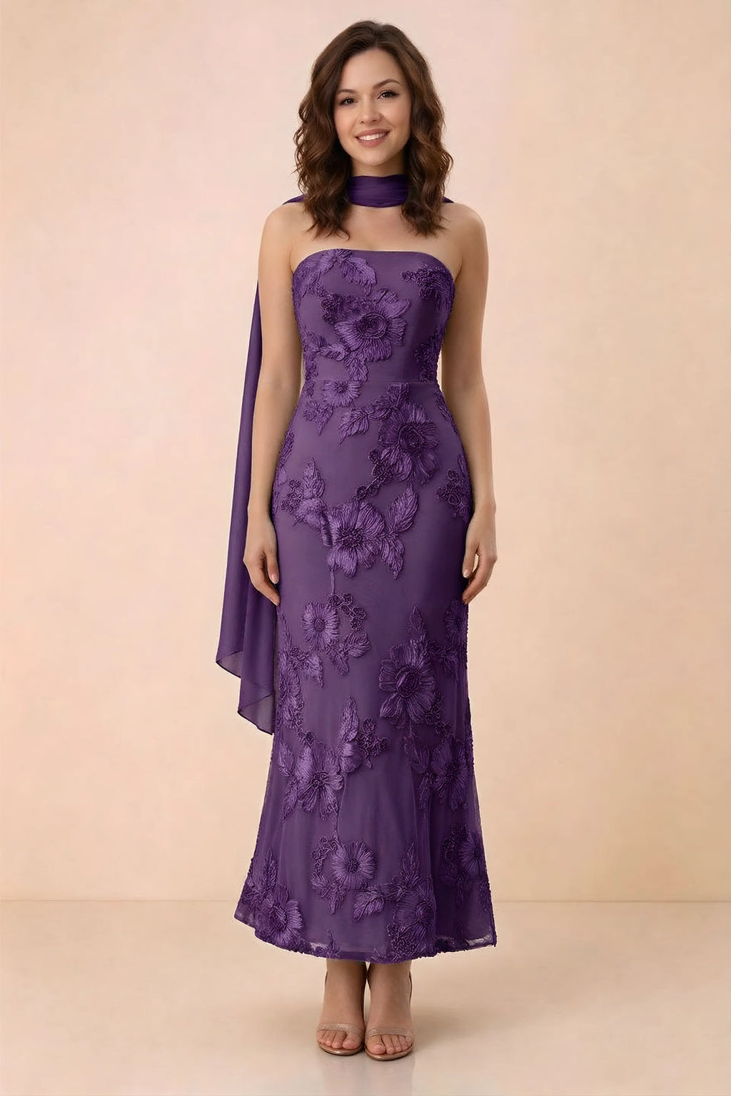 Front studio view of Carey plum strapless floral applique maxi dress with a matching scarf