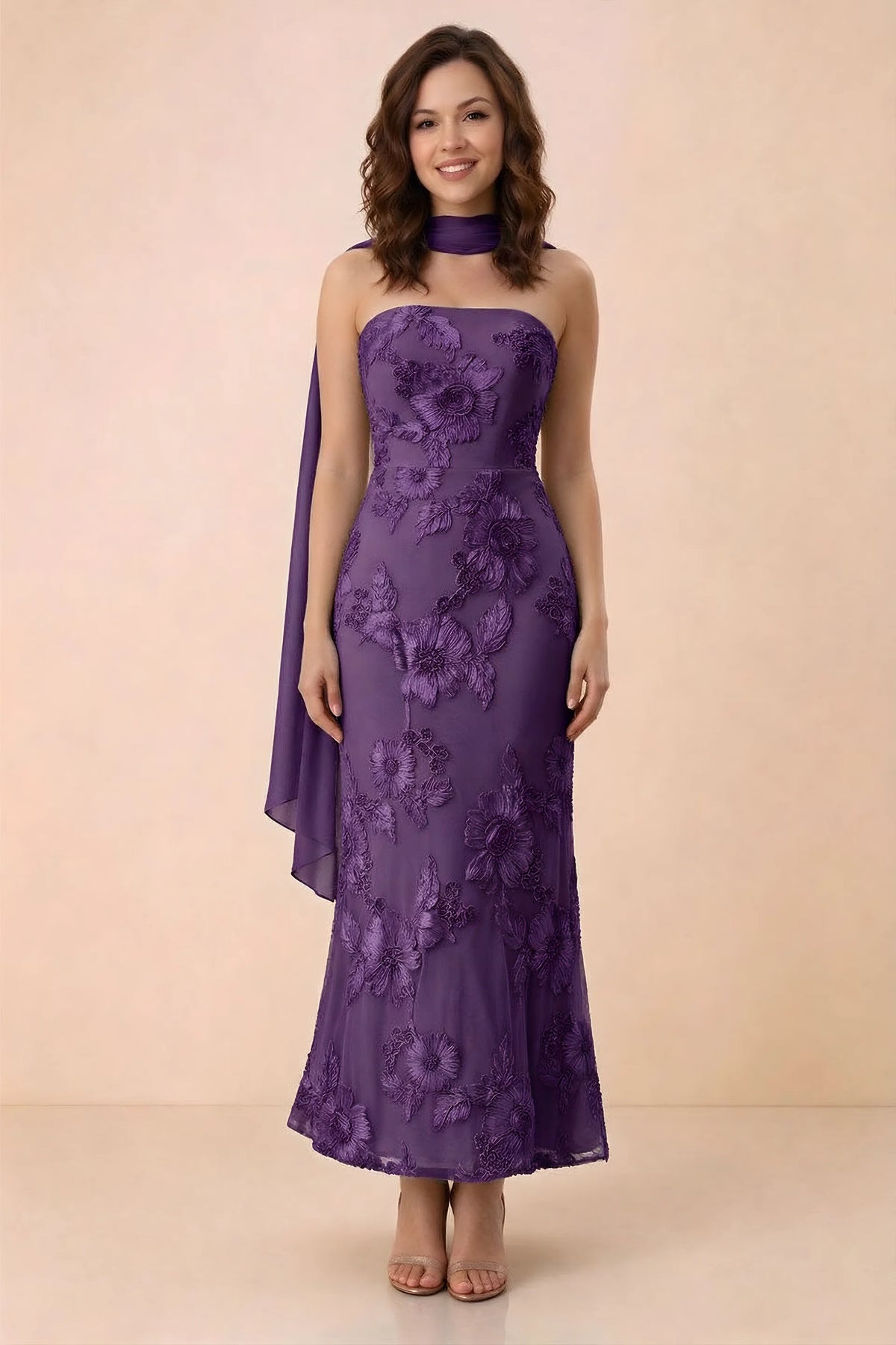 Front studio view of Carey plum strapless floral applique maxi dress with a matching scarf