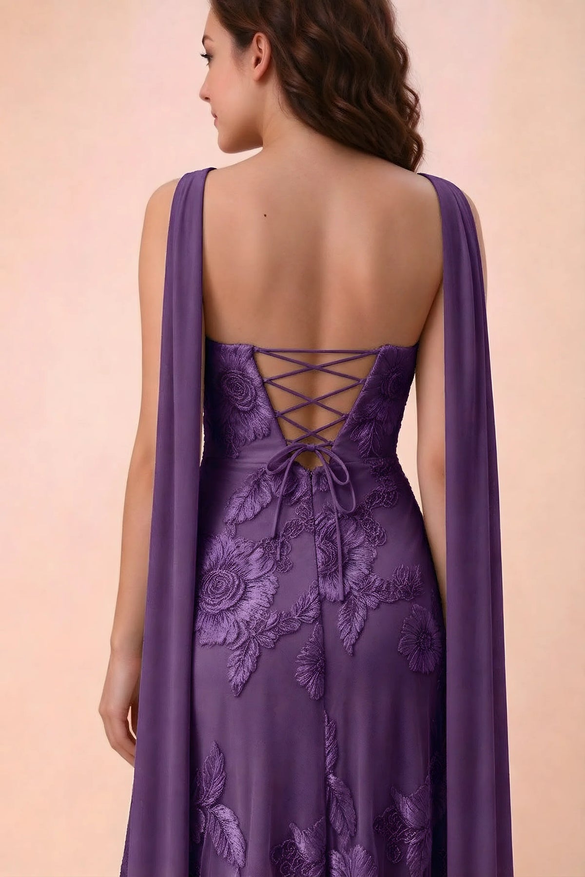 Close-up of Carey plum crossed back lacing with scarf ends over the shoulders