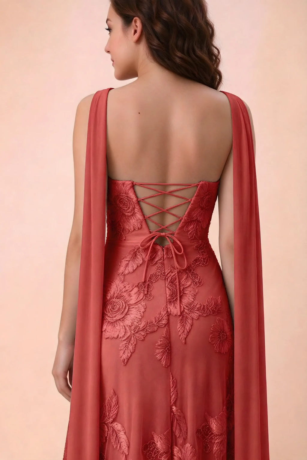 Close-up of Carey red crossed back lacing with scarf ends over the shoulders