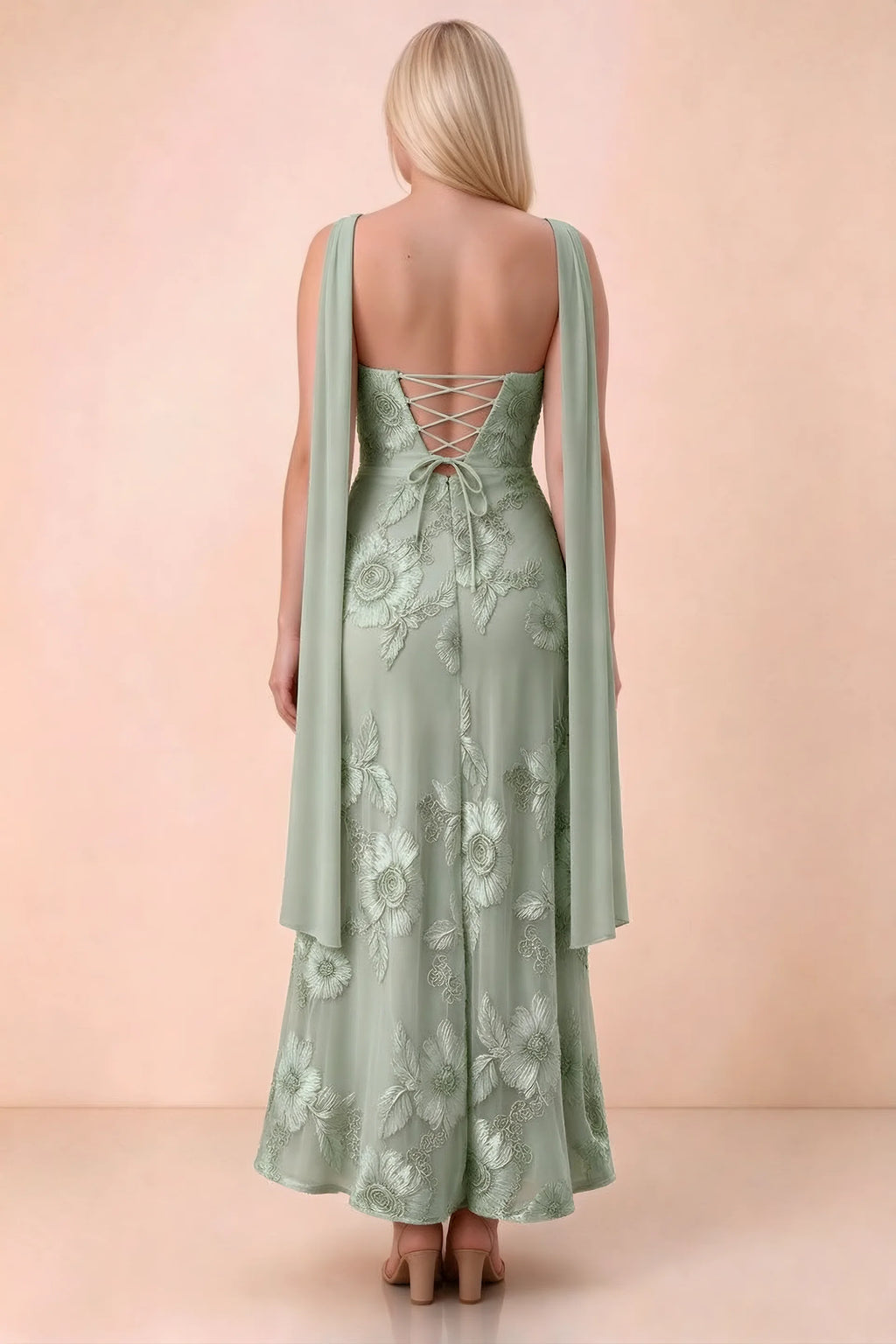Rear studio view of Carey sage green dress showing the gently flared ankle-length skirt