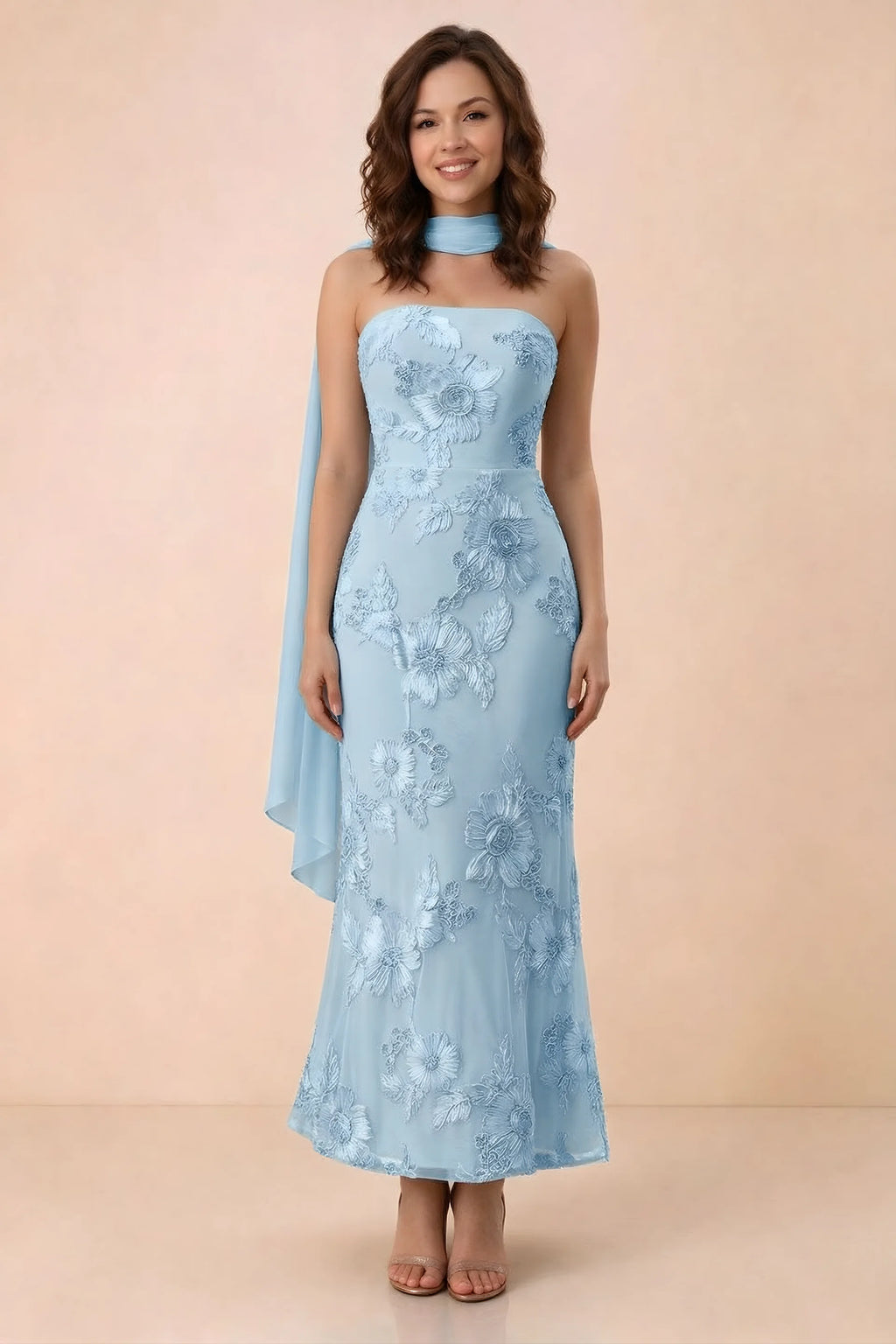 Front studio view of Carey sky blue strapless floral applique maxi dress with a matching scarf