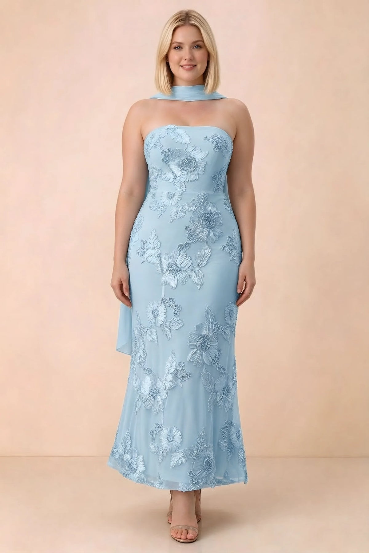 Front studio view of Carey sky blue floral maxi dress with the scarf wrapped around the neck