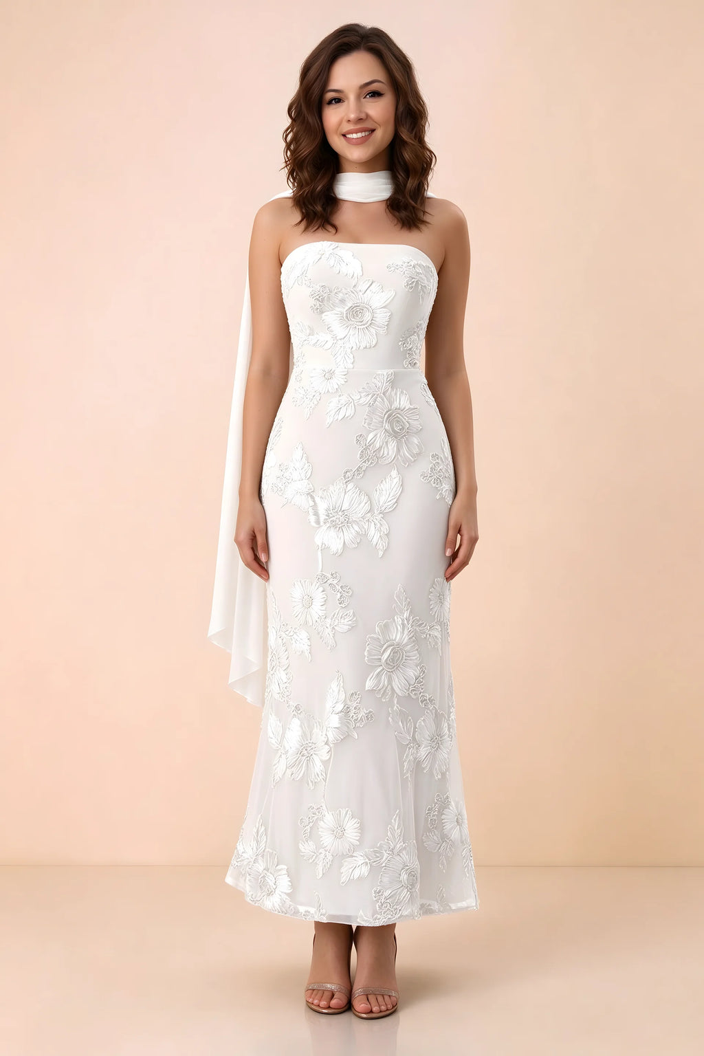 Front studio view of Carey white strapless floral applique maxi dress with a matching scarf