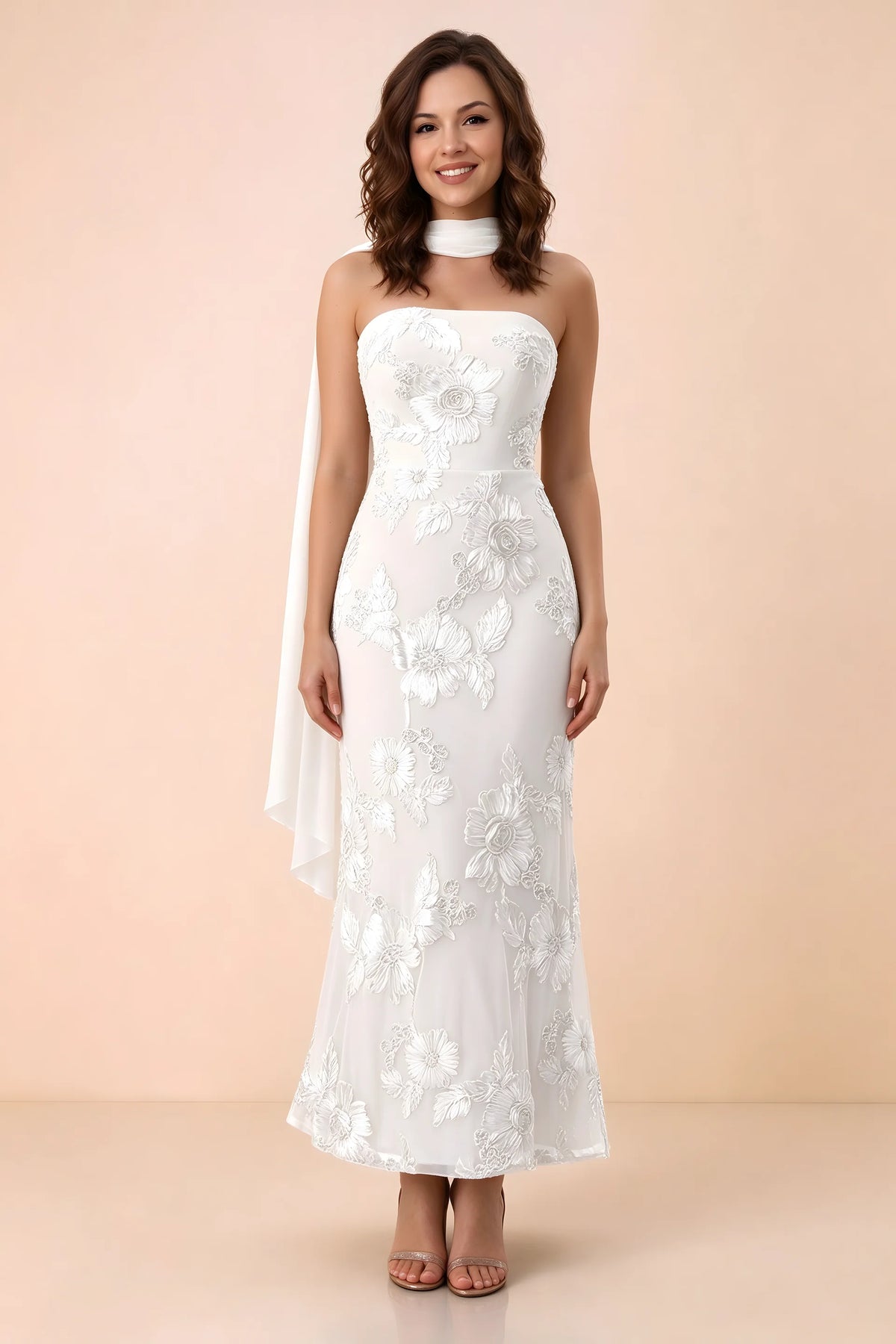 Front studio view of Carey white strapless floral applique maxi dress with a matching scarf
