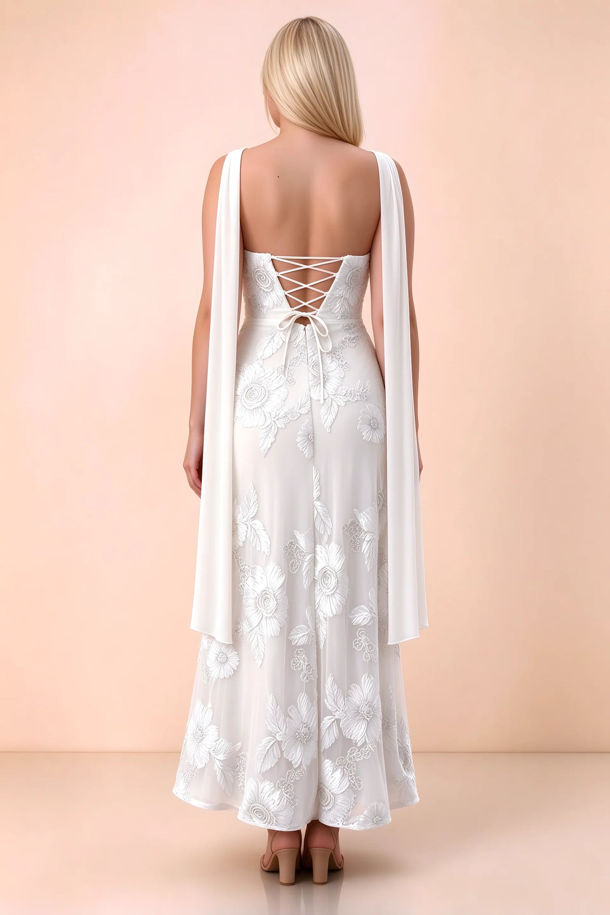 Rear studio view of Carey white dress showing the gently flared ankle-length skirt