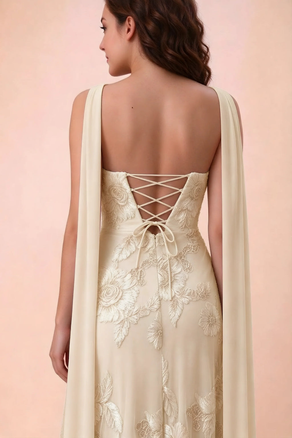Close-up of Carey yellow crossed back lacing with scarf ends over the shoulders