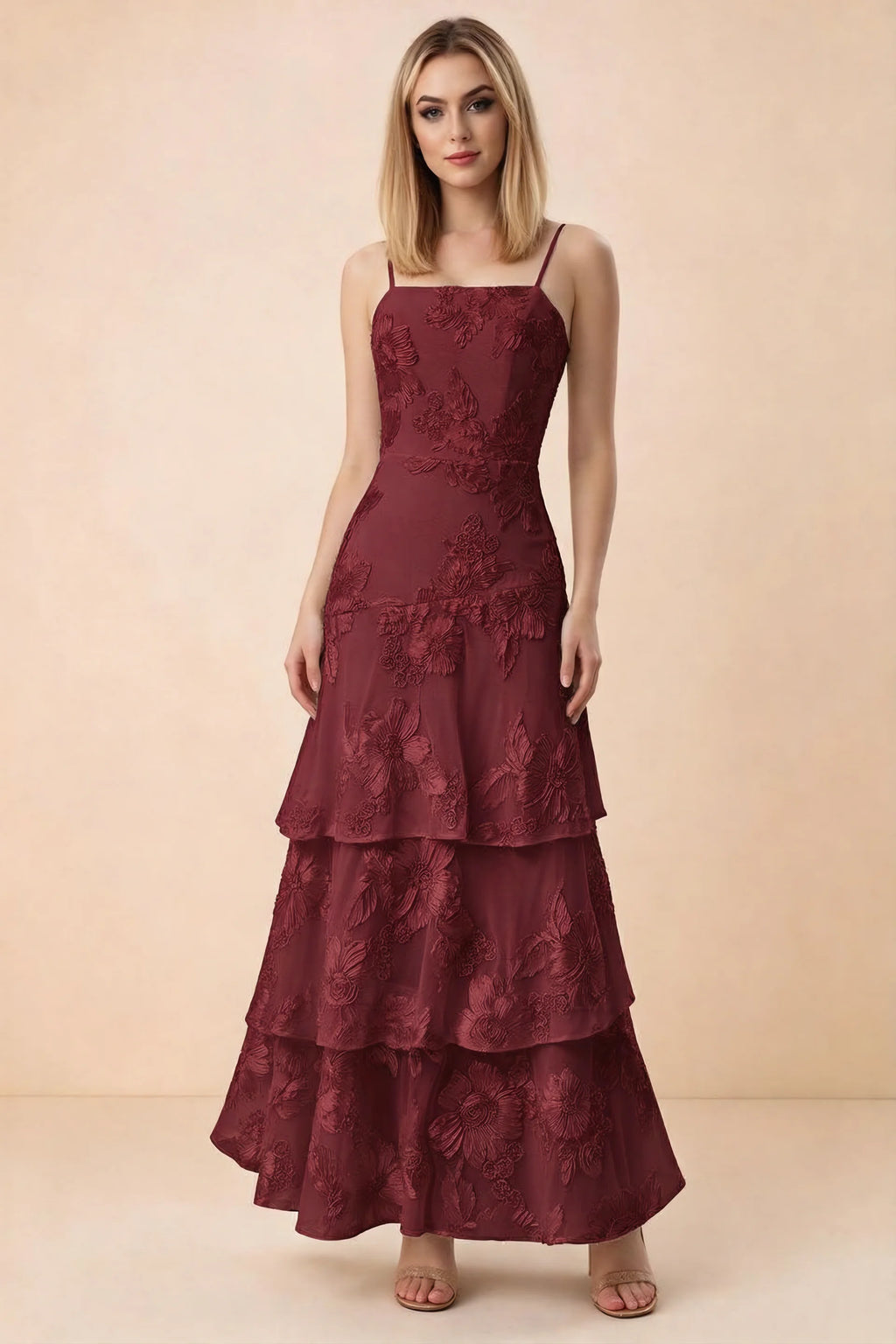 Front studio view of Bonnie burgundy floral lace maxi dress with thin straps and three ruffle tiers