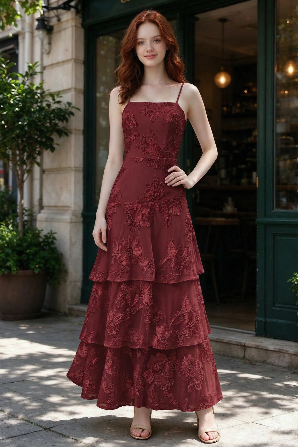 Outdoor front view of Bonnie burgundy floral ruffle dress outside a cafe