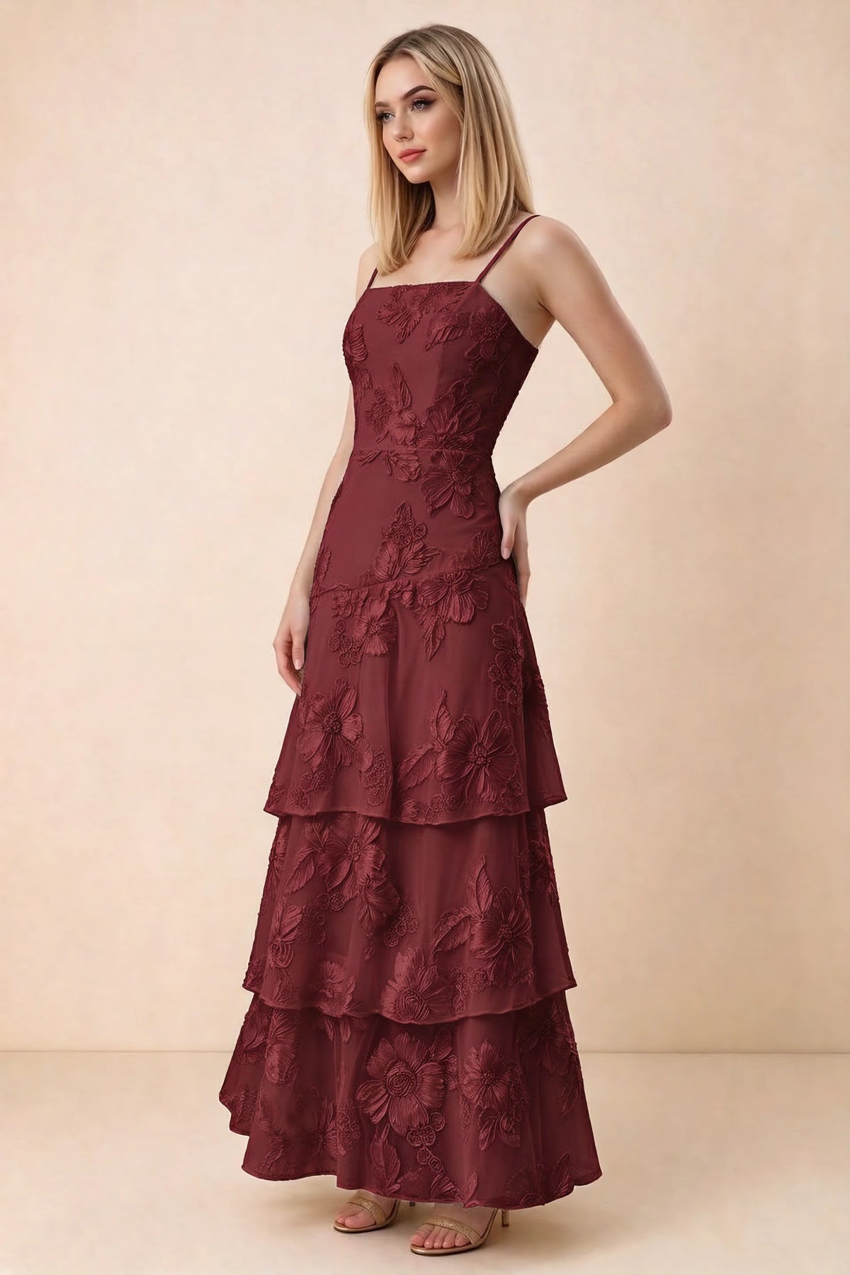 Three-quarter studio view of Bonnie burgundy dress showing the fitted waist and flared ruffle tiers