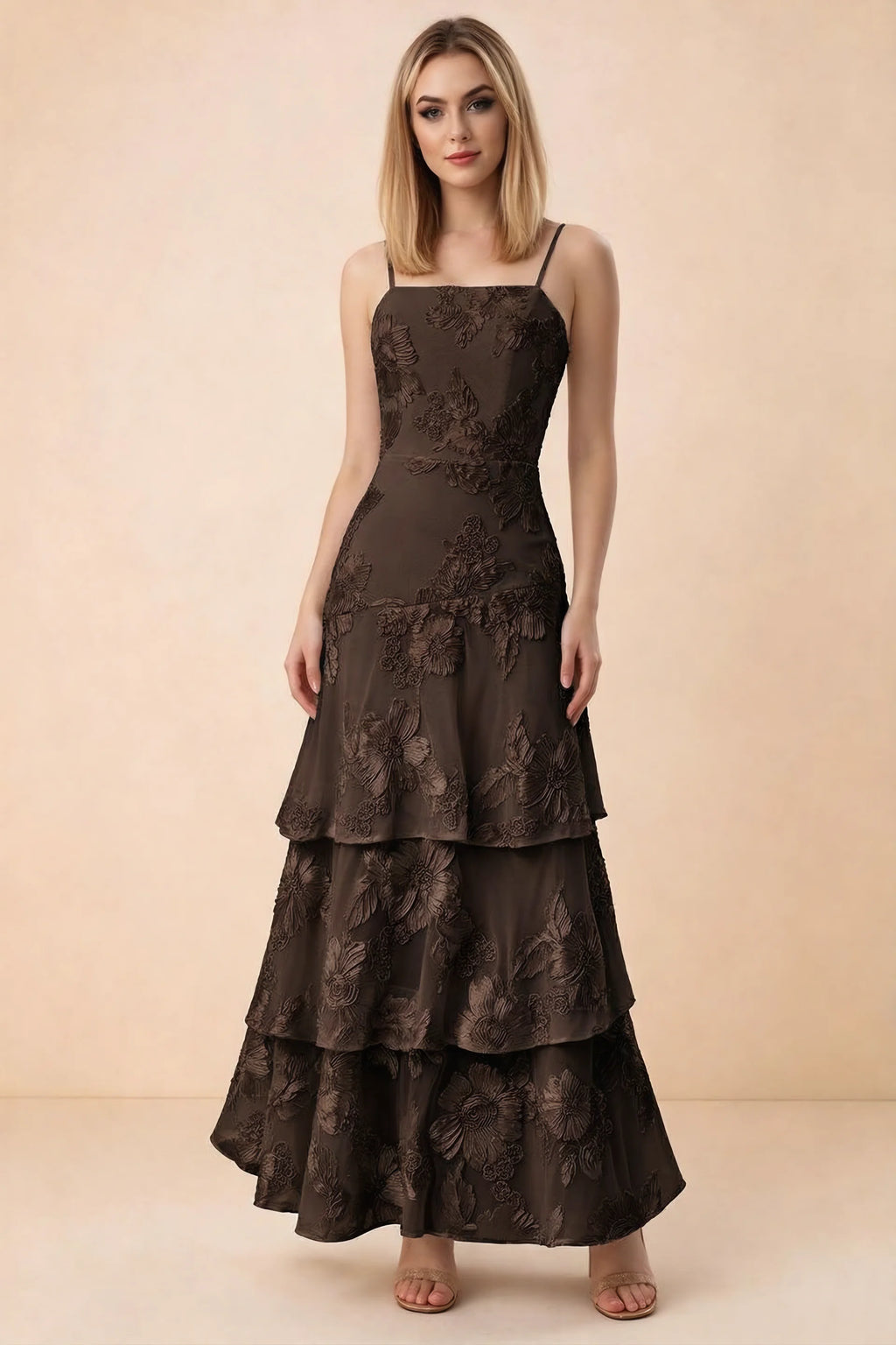 Front studio view of Bonnie chocolate floral lace maxi dress with thin straps and three ruffle tiers