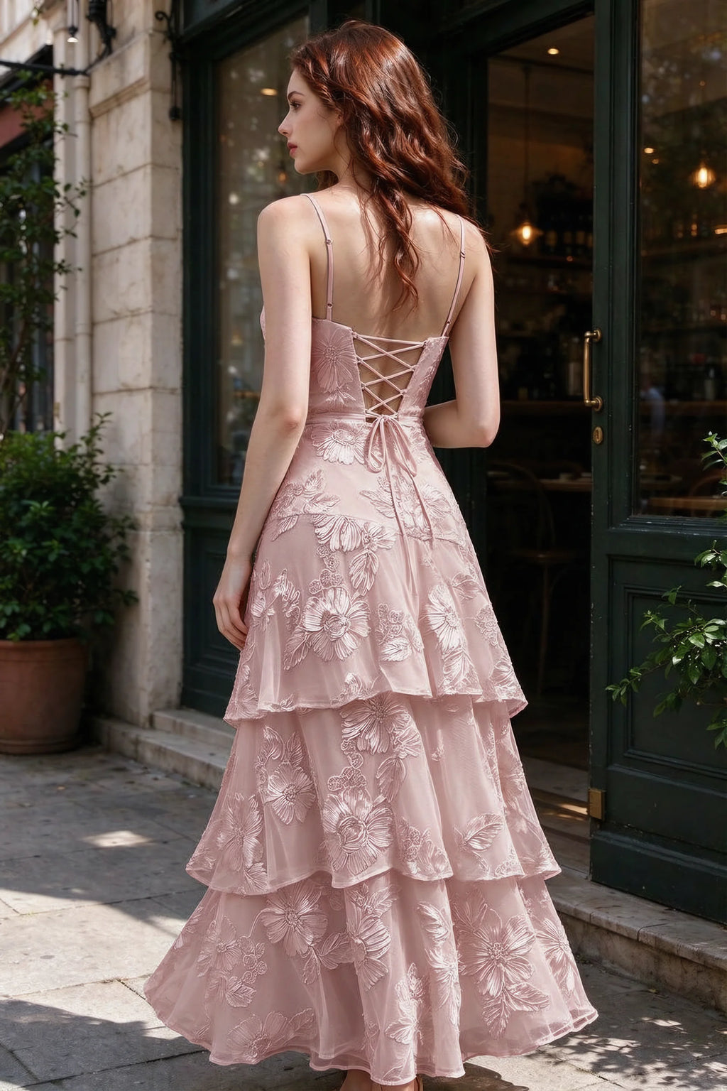 Outdoor rear view of Bonnie dusty lilac dress showing the lace-up back and layered skirt
