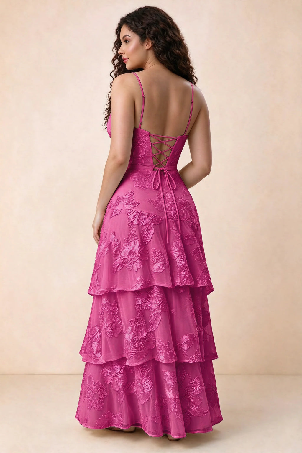 Rear studio view of Bonnie fuchsia dress showing three overlapping tiers and an ankle-length hem