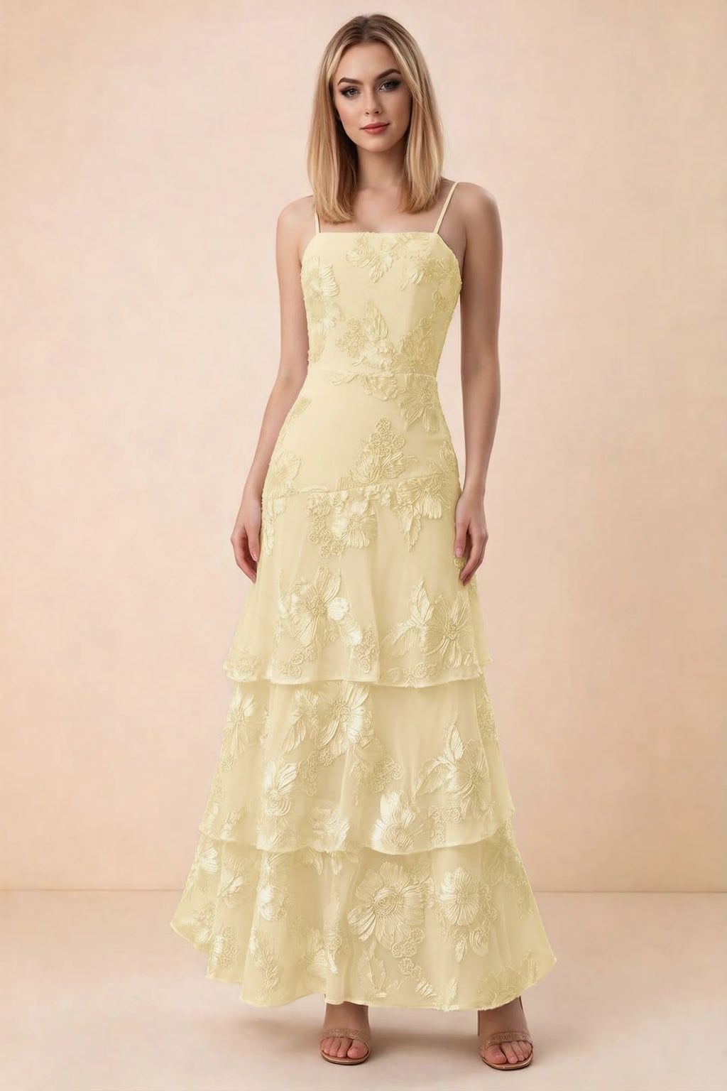 Front studio view of Bonnie lemon floral lace maxi dress with thin straps and three ruffle tiers