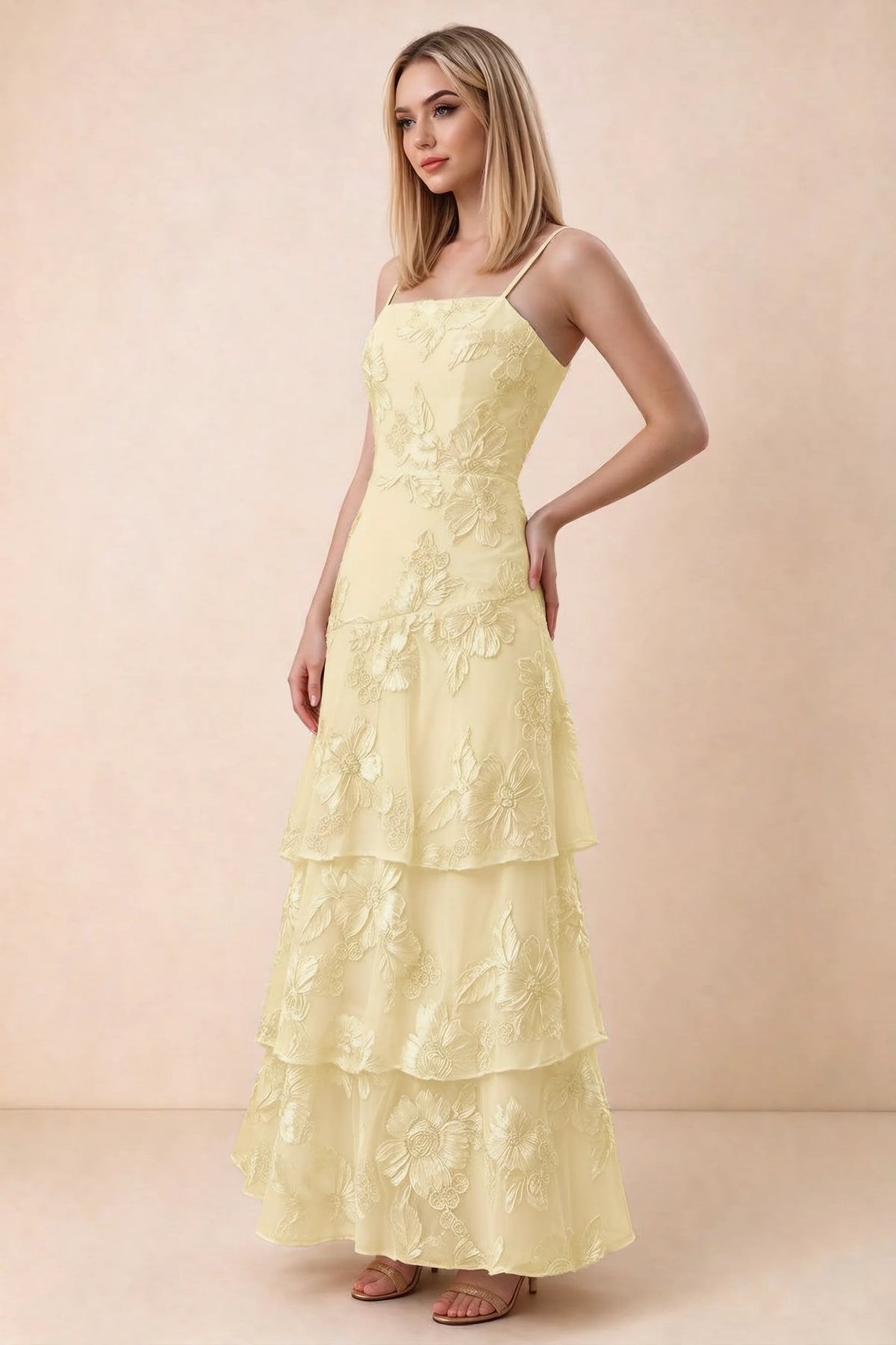 Three-quarter studio view of Bonnie lemon dress showing the fitted waist and flared ruffle tiers