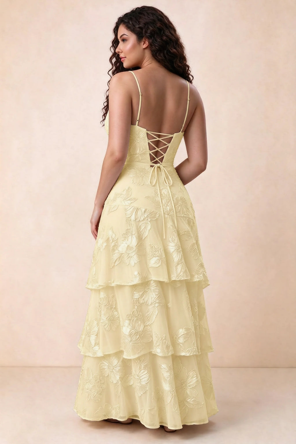 Rear studio view of Bonnie lemon dress showing three overlapping tiers and an ankle-length hem