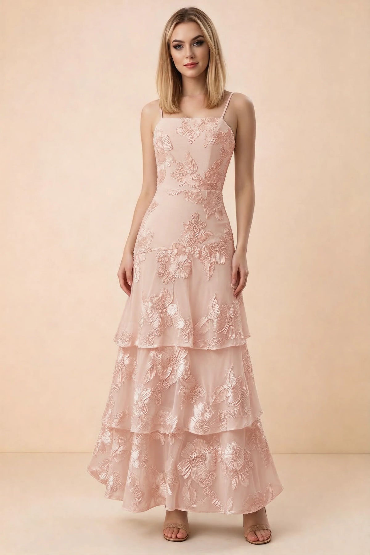 Front studio view of Bonnie light pink floral lace maxi dress with thin straps and three ruffle tiers