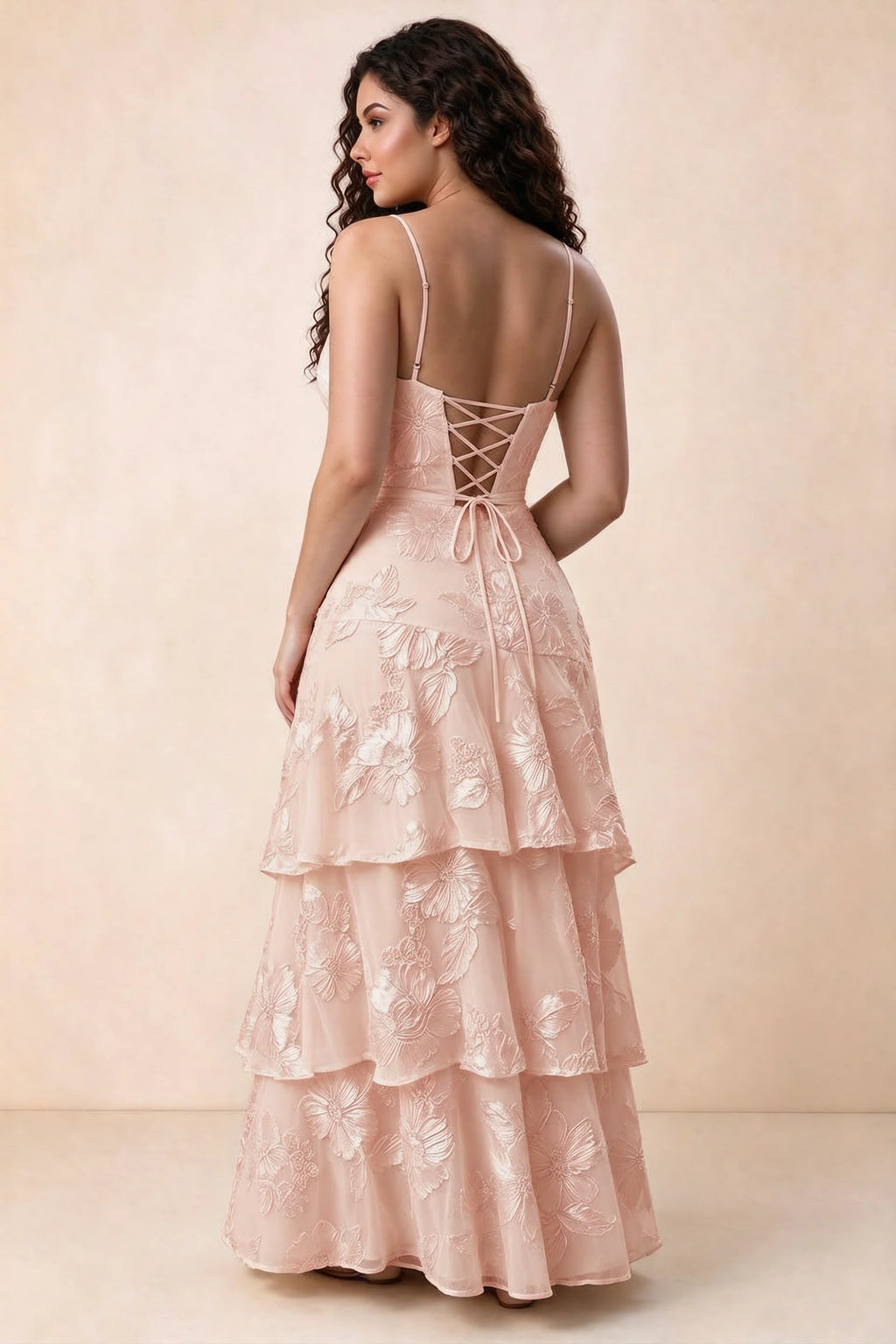 Rear studio view of Bonnie light pink dress showing three overlapping tiers and an ankle-length hem