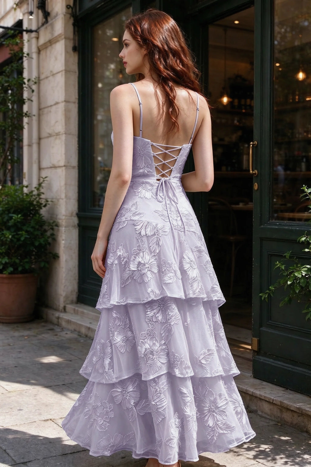 Outdoor rear view of Bonnie pale purple dress showing the lace-up back and layered skirt