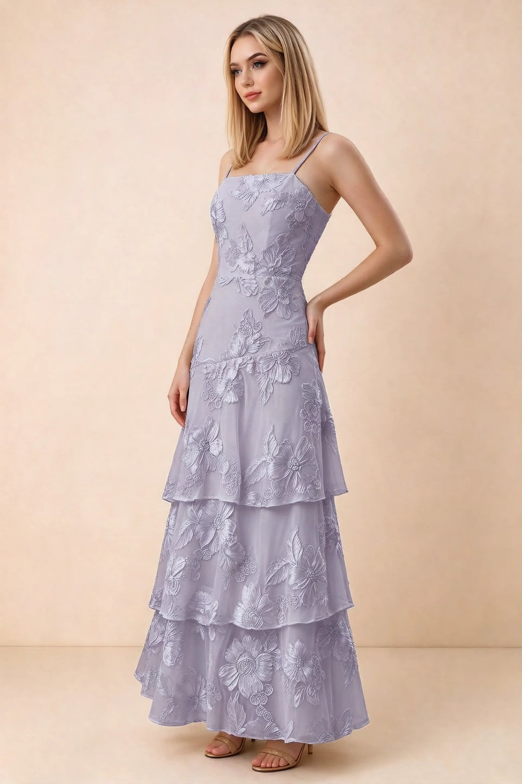 Three-quarter studio view of Bonnie pale purple dress showing the fitted waist and flared ruffle tiers